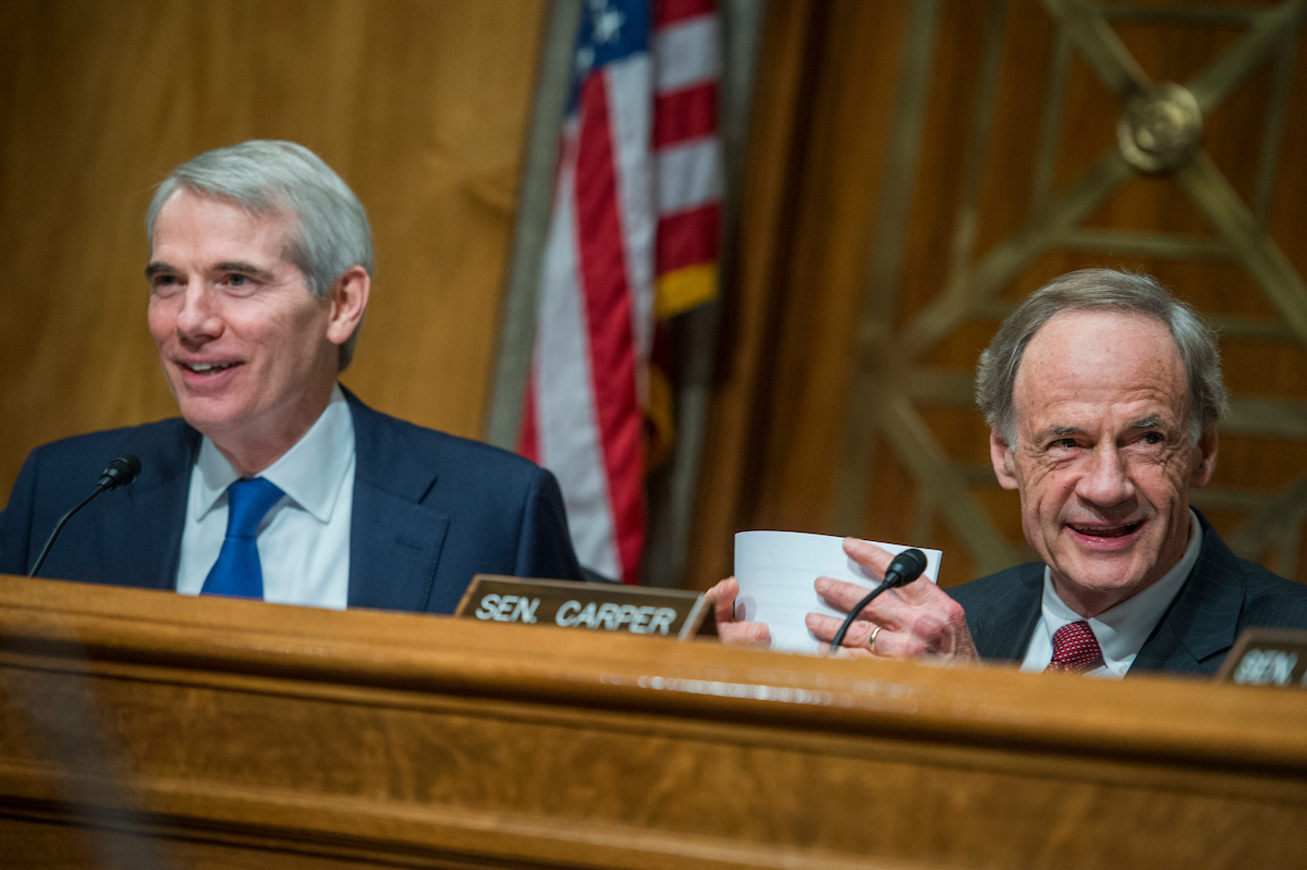 UNITED STATES - MAY 25: Chairman Rob Portman, R-Ohio, left, and Ranking Member Tom Carper, D-Del., conduct a Senate Committee on Homeland Security and Governmental Affairs Permanent Subcommittee on Investigations hearing in Dirksen Building titled "Stopping the Shipment of Synthetic Opioids: Oversight of U.S. Strategy to Combat Illicit Drugs" on May 25, 2017. (Photo By Tom Williams/CQ Roll Call)