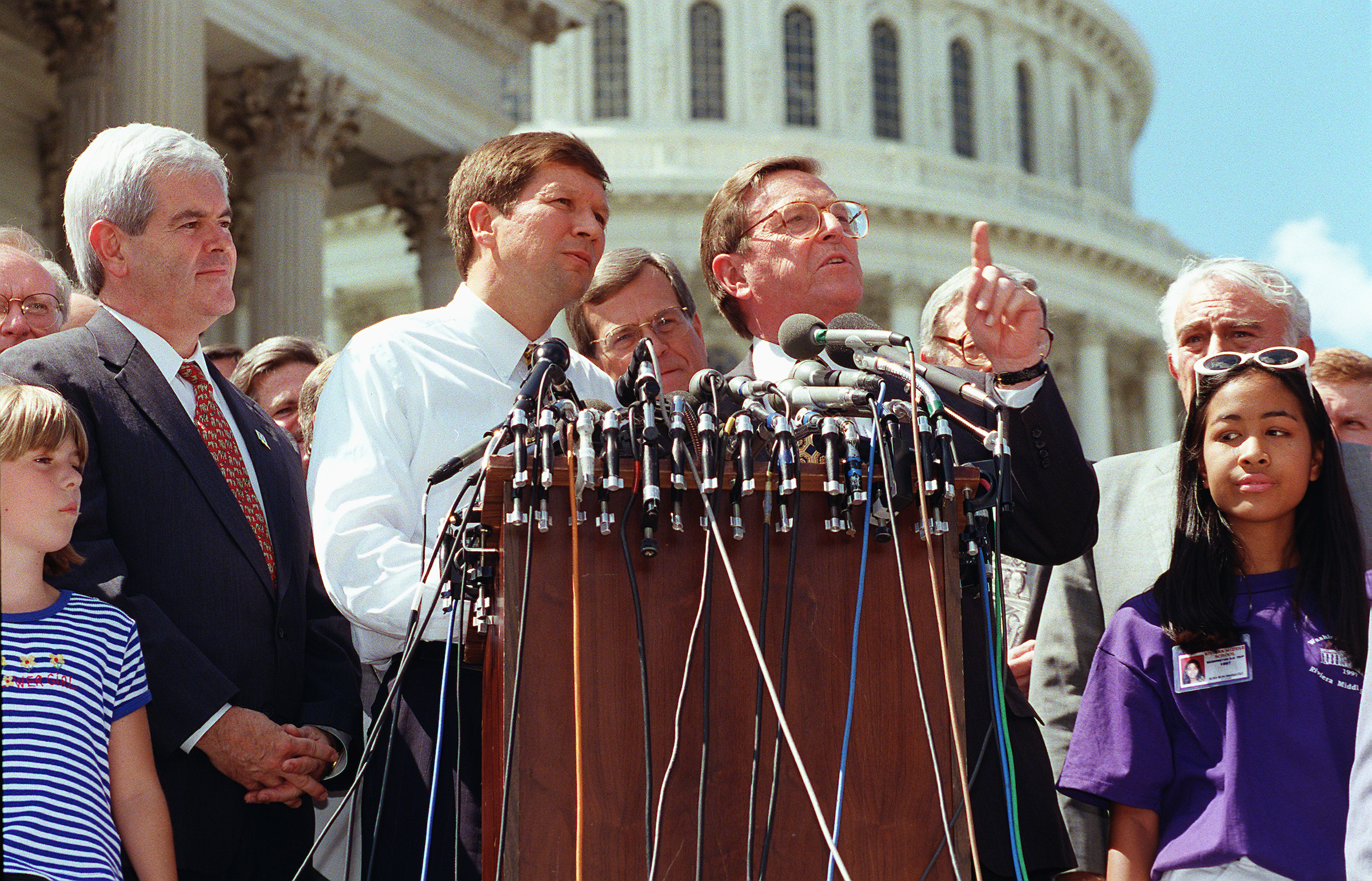 Senate Budget Chairman Pete Domenici, R-N.M., speaking, and House Speaker Newt Gingrich, R-Ga., House Budget Chairman John Kasich, R-Ohio, on July 20, 1997 at a GOP celebration on the House steps of the budget and tax agreement with the White House. (SCOTT J. FERRELL/CQ file photo)