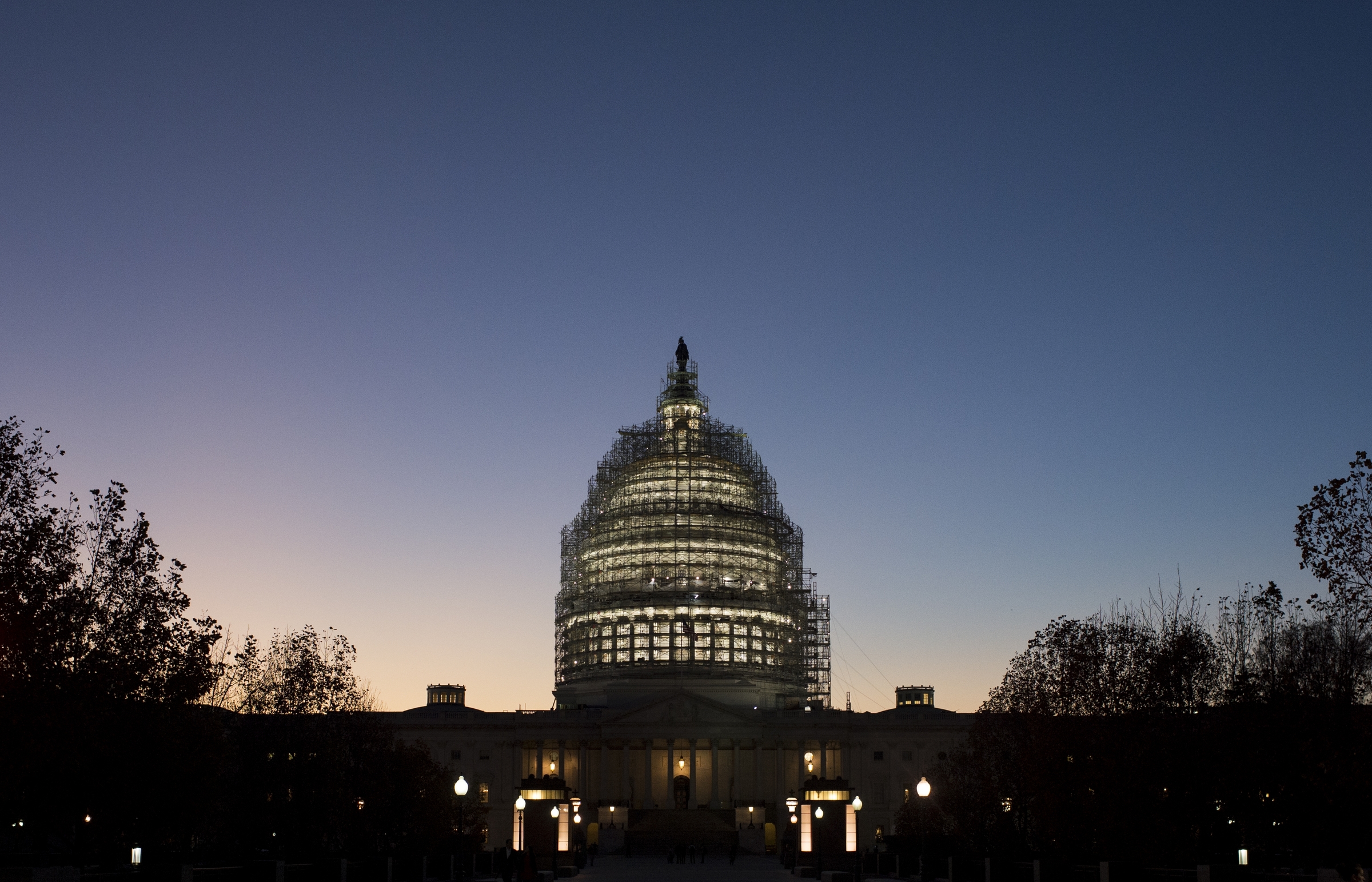 The sun sets over the U.S. Capitol in Washington in November 2015. (Bill Clark/CQ Roll Call file photo)