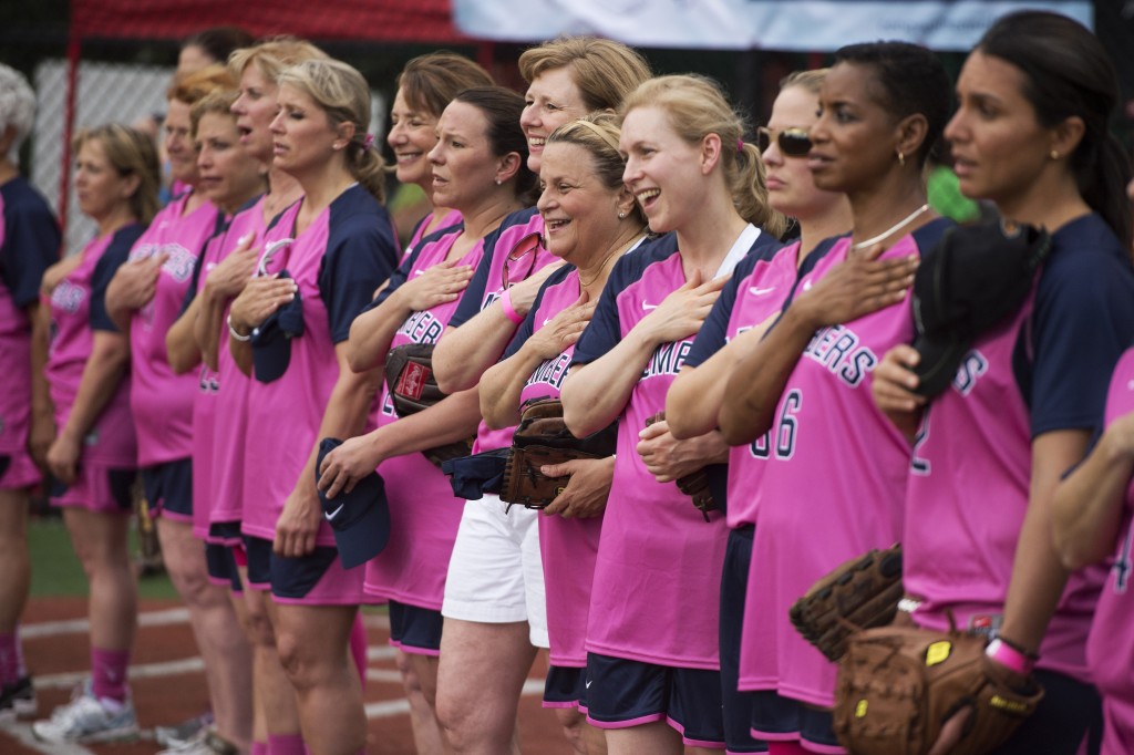 Lawmakers line up for for the National Anthem before the 2013 Congressional Women’s Softball Game. (Tom Williams/CQ Roll Call file photo)