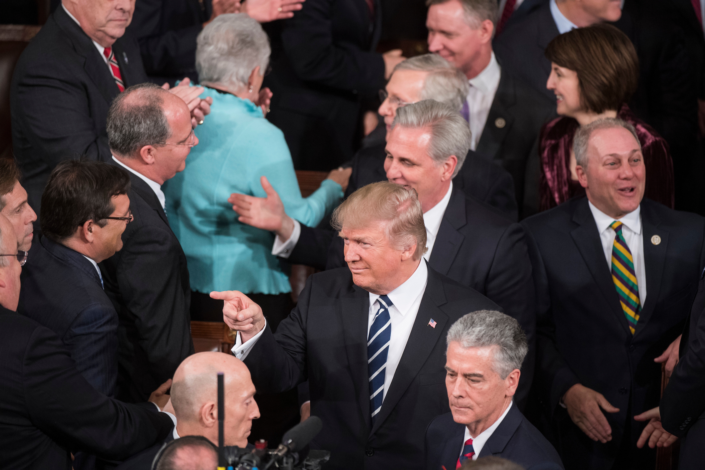 House Majority Whip Steve Scalise (far right) trails President Donald Trump into the House chamber last Tuesday night before the president’s first address to a joint session of Congress. A week later, Scalise and his deputy whips made clear Trump also owns a health care overhaul bill they released this week. (Tom Williams/CQ Roll Call)