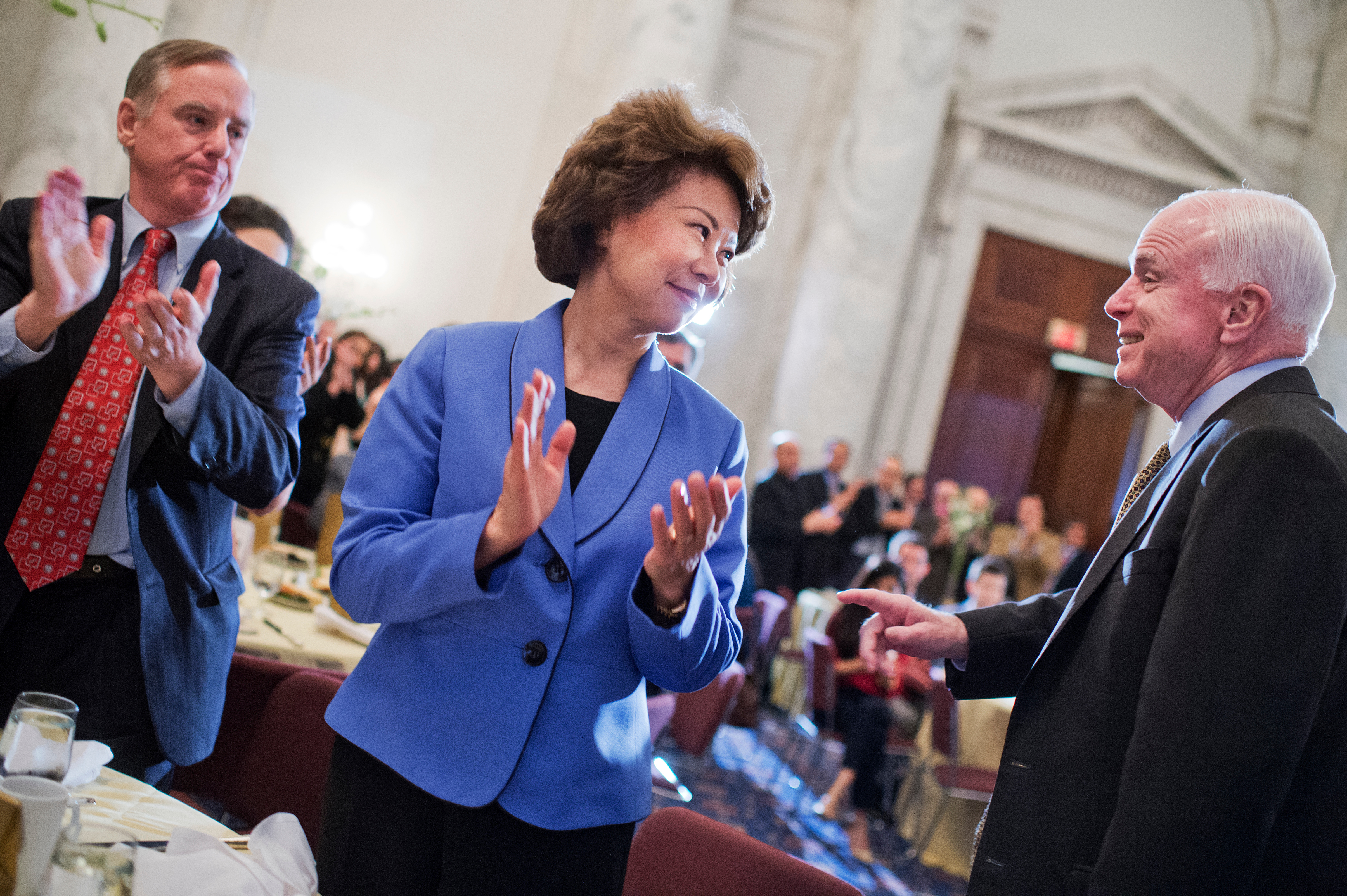 From left, former Vermont Gov. Howard Dean, current Transportation Secretary Elaine Chao, and Arizona Sen. John McCain attended last year's Norwuz celebration on the Hill. (Tom Williams/CQ Roll Call file photo)