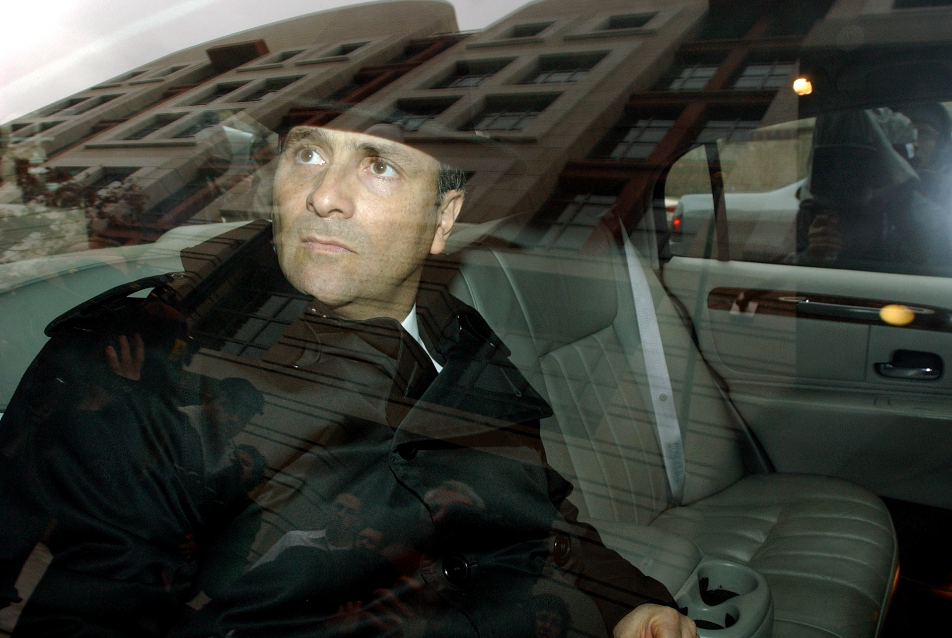 After leaving Prettyman Federal Courthouse in Washington, D.C. in 2006, Jack Abramoff, waits to leave the premises, after entering a plea agreement on three felony charges. (CQ Roll Call File Photo)