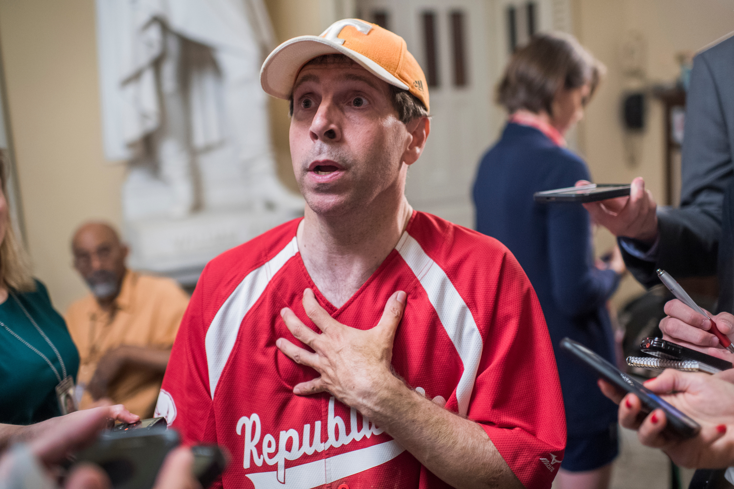 Tennessee Rep. Chuck Fleischmann tells reporters about the scene at the Republicans’ baseball practice on Wednesday in Alexandria, Virginia, where a gunman wounded five people, including Majority Whip Steve Scalise. (Tom Williams/CQ Roll Call)