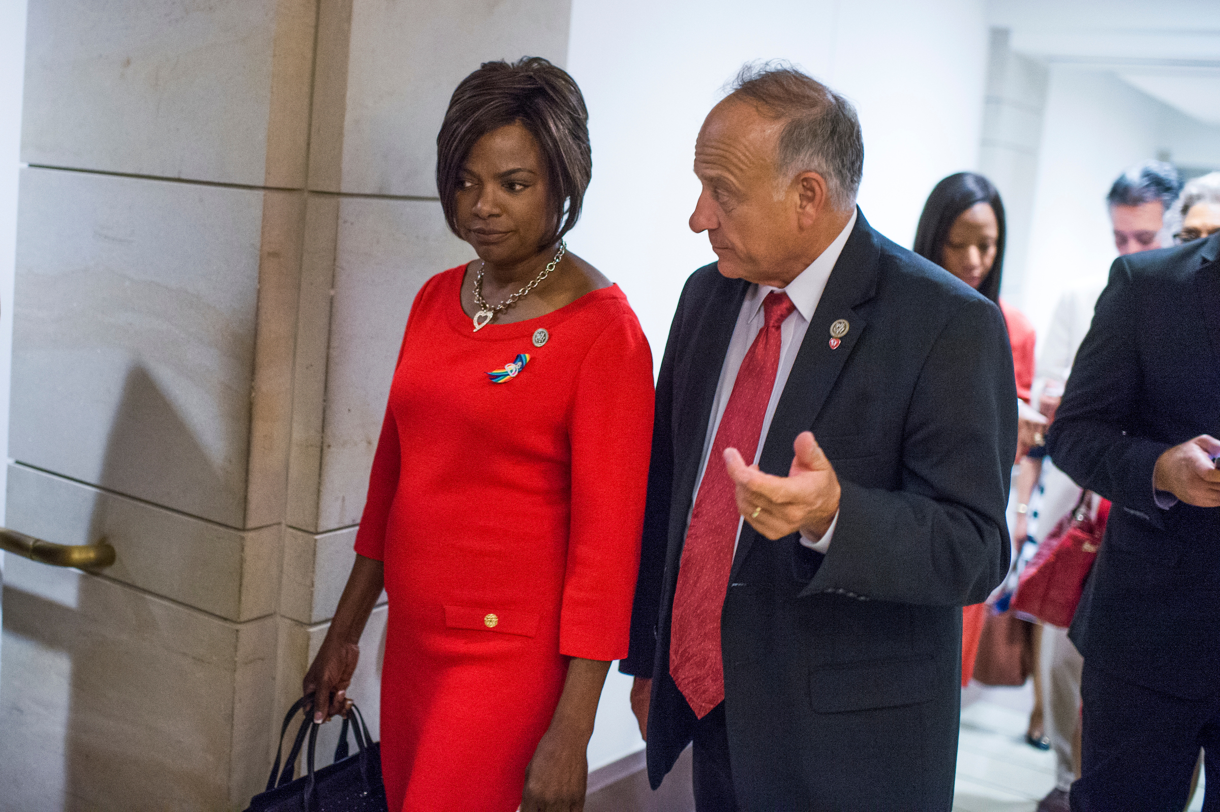 Reps. Steve King of Iowa and Val B. Demings of Florida leave a congressional meeting about Wednesday’s shooting at the Republicans’ baseball practice in Alexandria, Va. (Tom Williams/CQ Roll Call)