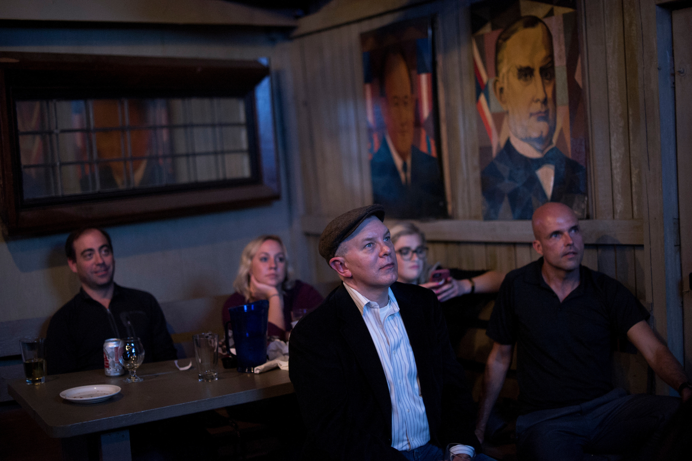 Guests watch the last presidential debate in 2016 at Capitol Lounge on Pennsylvania Avenue in Washington. (Tom Williams/CQ Roll Call file photo)