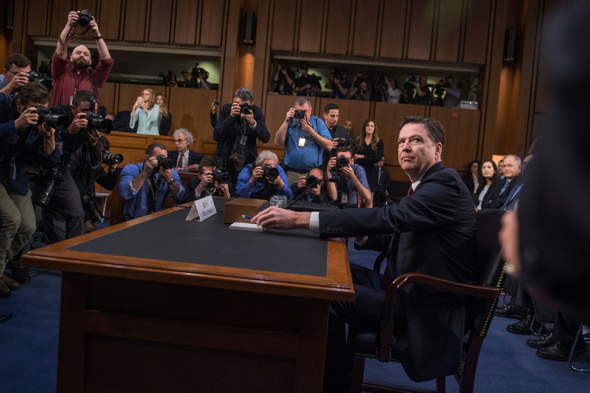 Former FBI Director James Comey arrives to testify before the Senate Intelligence Committee on Thursday. (Tom Williams/CQ Roll Call)