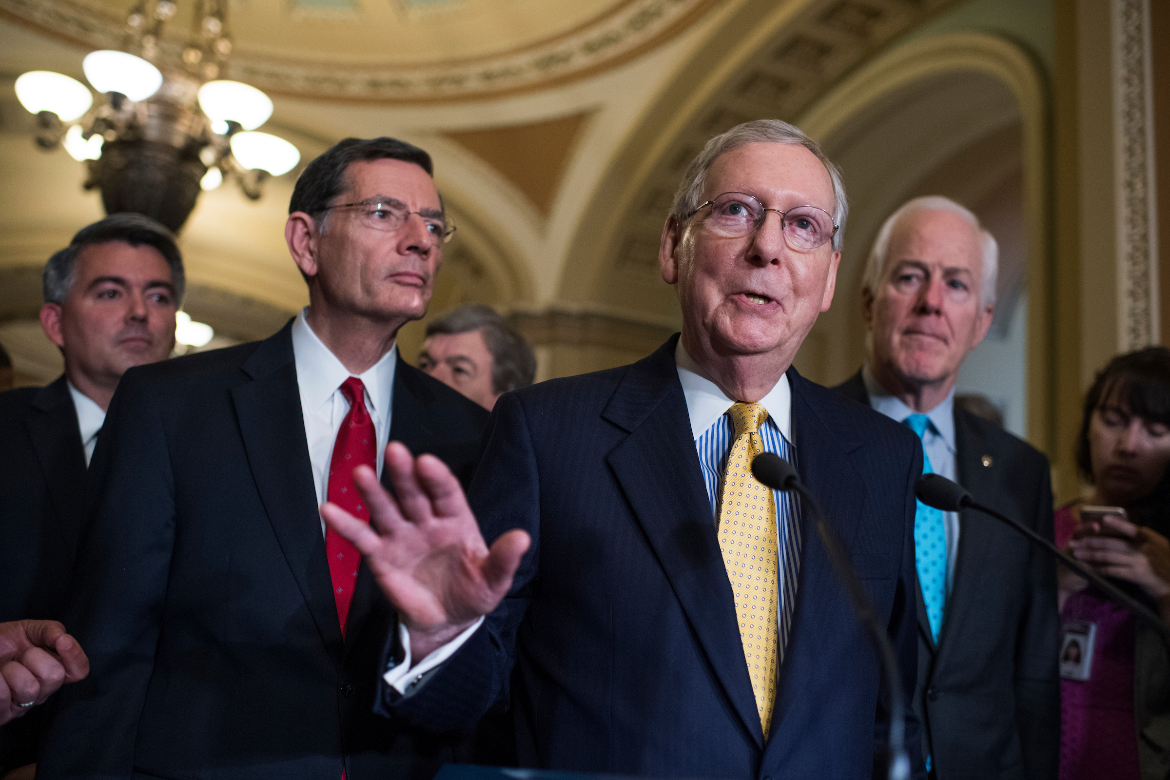 A group of 13 Senate Republicans worked on the health care overhaul bill released Thursday. From left, Sens. Cory Gardner, R-Colo., John Barrasso, R-Wyo., Roy Blunt, R-Mo., Senate Majority Leader Mitch McConnell, R-Ky., and Majority Whip John Cornyn, R-Texas on June 6, 2017. (Tom Williams/CQ Roll Call)