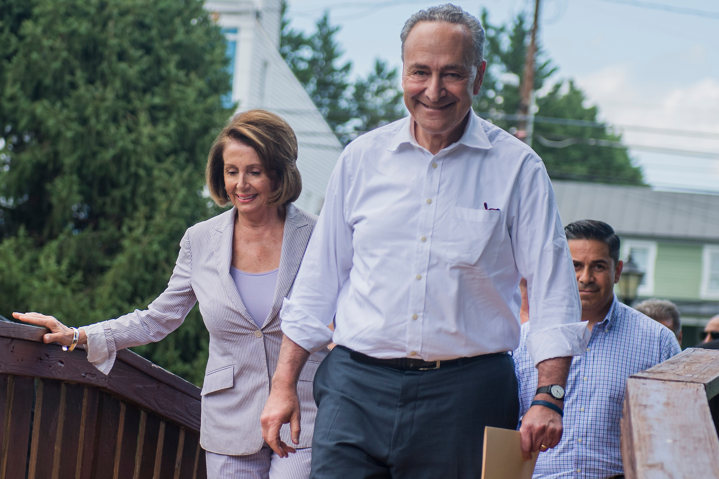 Congressional Democrats, led by Senate Minority Leader Charles E. Schumer, center, House Minority Leader Nancy Pelosi, left, and Democratic Congressional Campaign Committee Chairman Ben Ray Luján, right, rolled out their new agenda on Monday. (Tom Williams/CQ Roll Call)