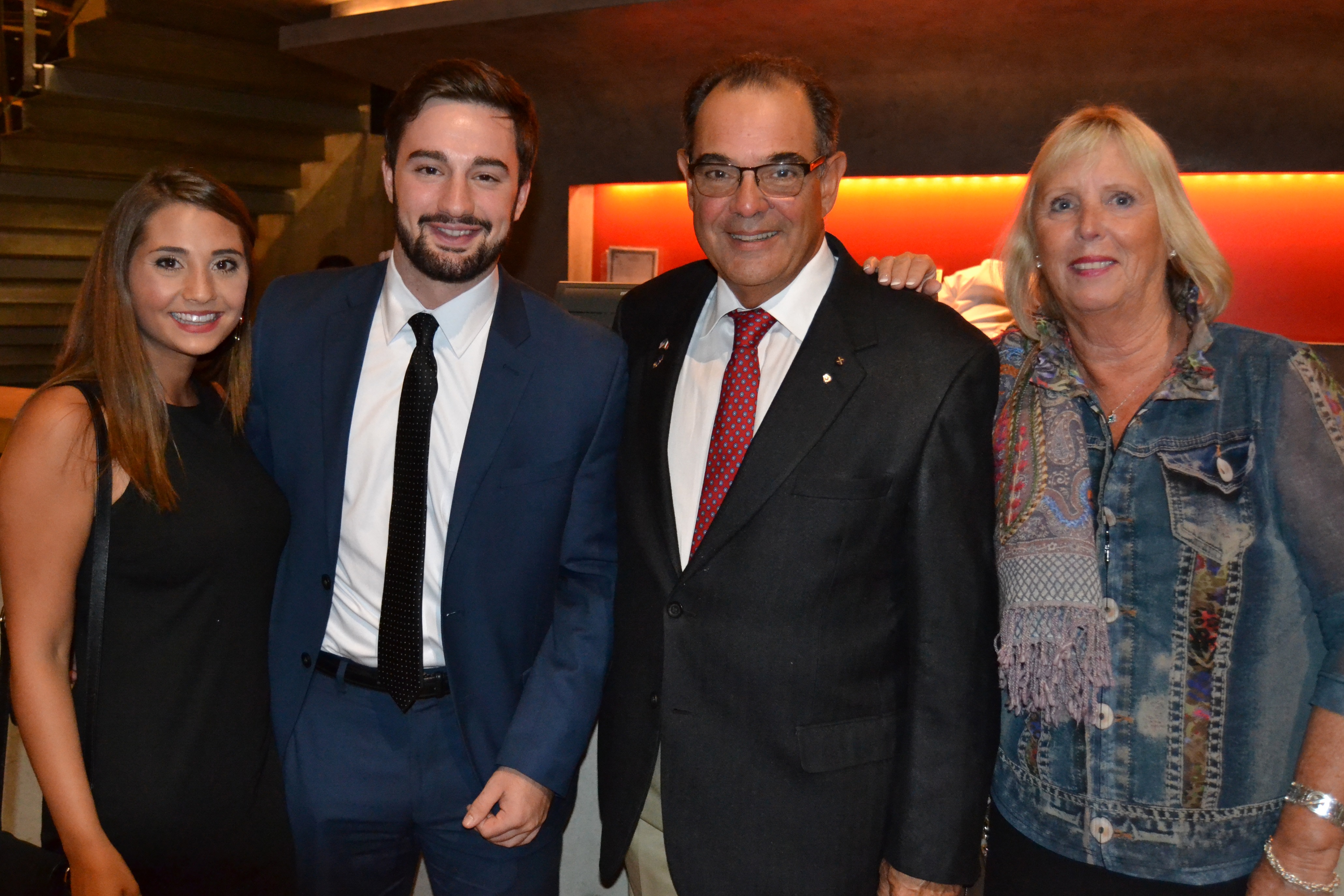 Scalia's grandson Antonin “Nino” Scalia, second from left, poses with actor Edward Gero, who portrays his grandfather, and their guests after Thursday’s performance. (Courtesy Arena Stage)