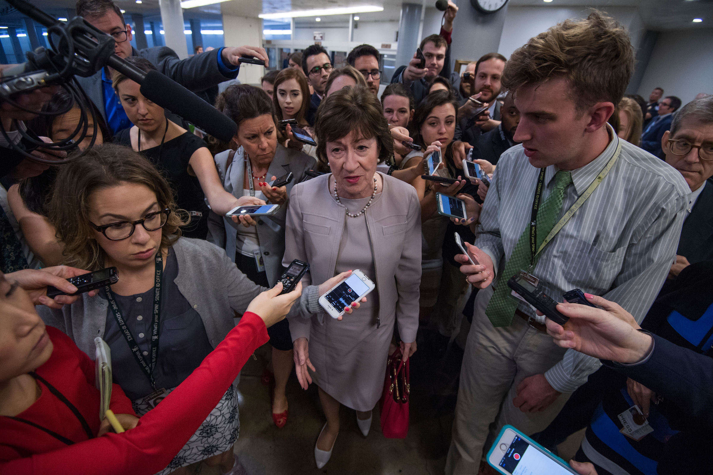 Sen. Susan Collins, R-Maine, talks with reporters in the senate subway before the Senate Policy luncheons in the Capitol on July 25, 2017. She would later vote no on the motion to proceed with the health care bill. (Tom Williams/CQ Roll Call)