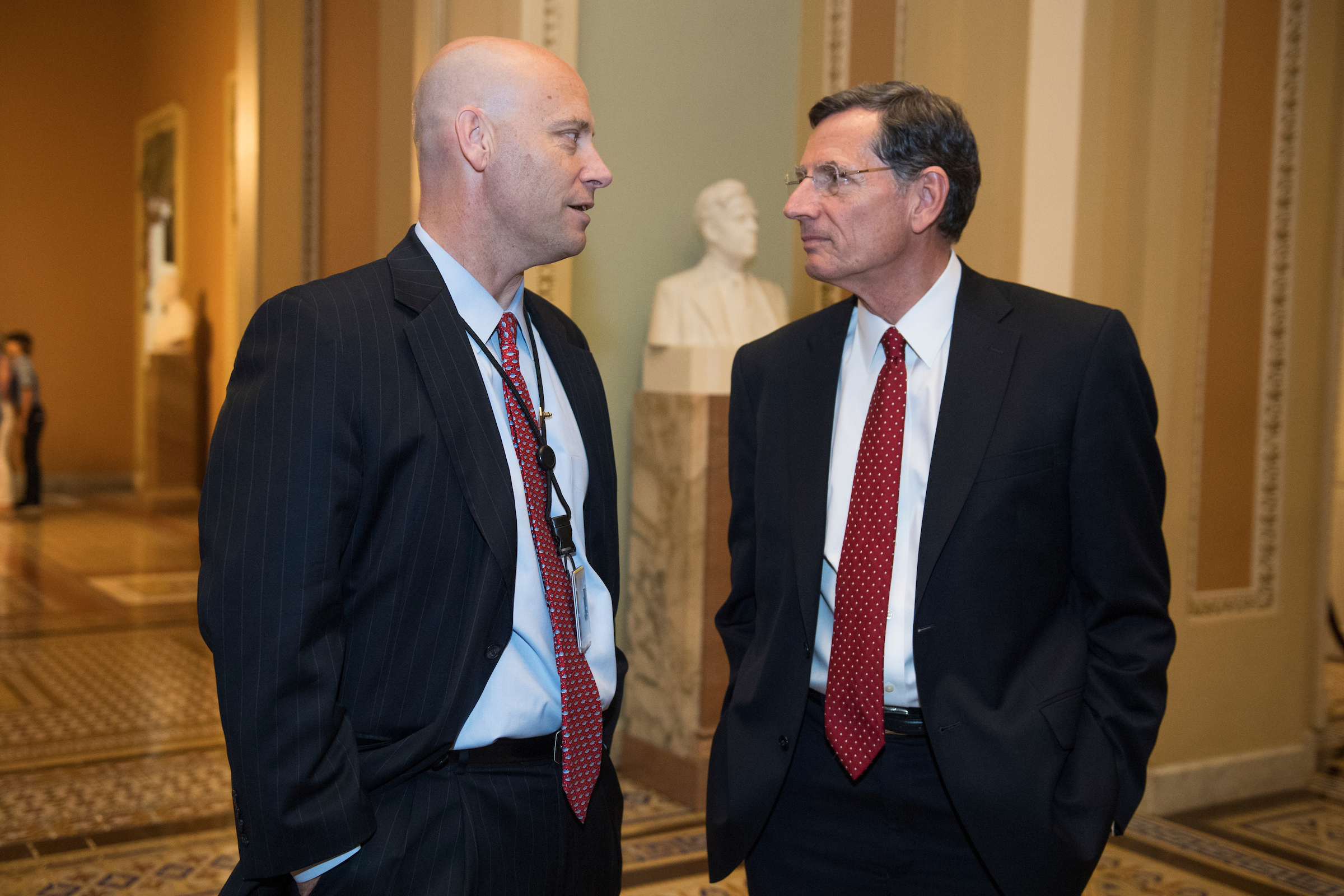 White House legislative affairs director Marc Short, left, here with Wyoming Sen. John Barrasso last week, has hopes for a bipartisan tax overhaul effort. (Tom Williams/CQ Roll)