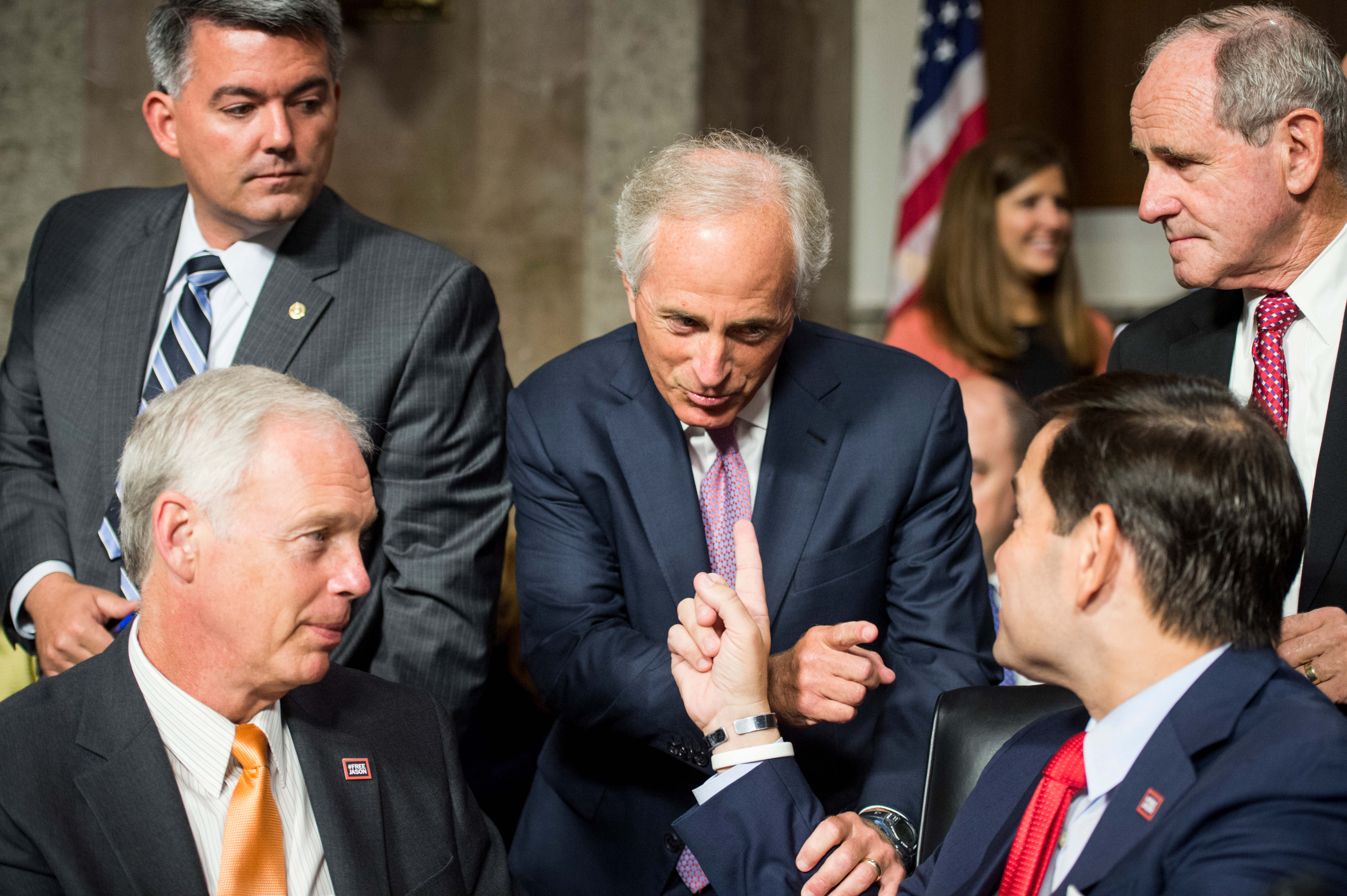 Republican Sens. Bob Corker (center), Marco Rubio (seated right) and Jim Risch (standing right) all declined to comment on GOP President Donald Trump's threat to "totally destroy" North Korea if it attacks the United States. Also pictured are GOP Sens. Cory Gardner (standing left) and Ron Johnson (seated left). (Bill Clark/CQ Roll Call file photo)