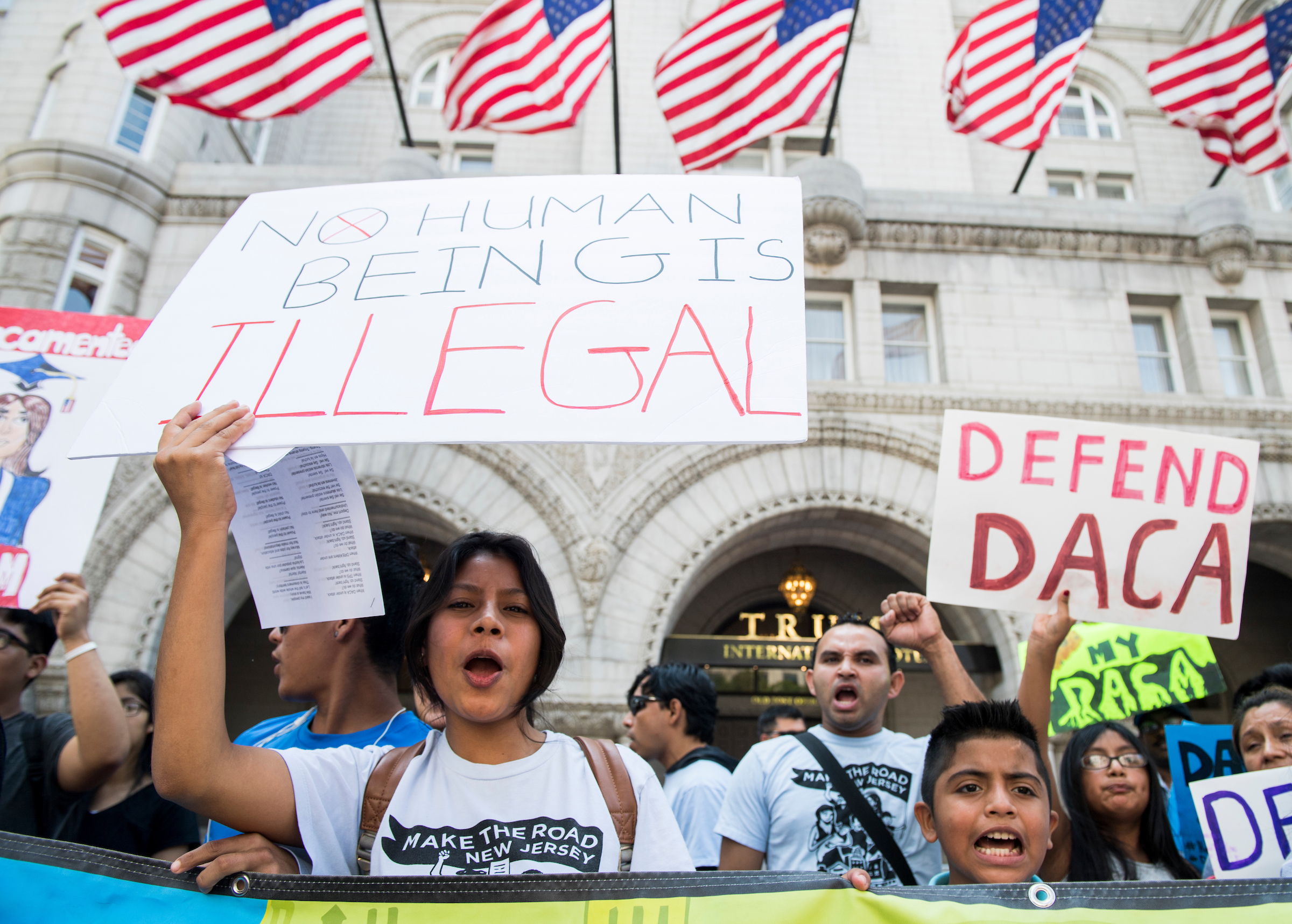 Demonstrators outside the Trump International Hotel on Tuesday. President Donald Trump’s decision to rescind the DACA program could imperil GOP majorities in the House and Senate, Murphy writes. (Bill Clark/CQ Roll Call)