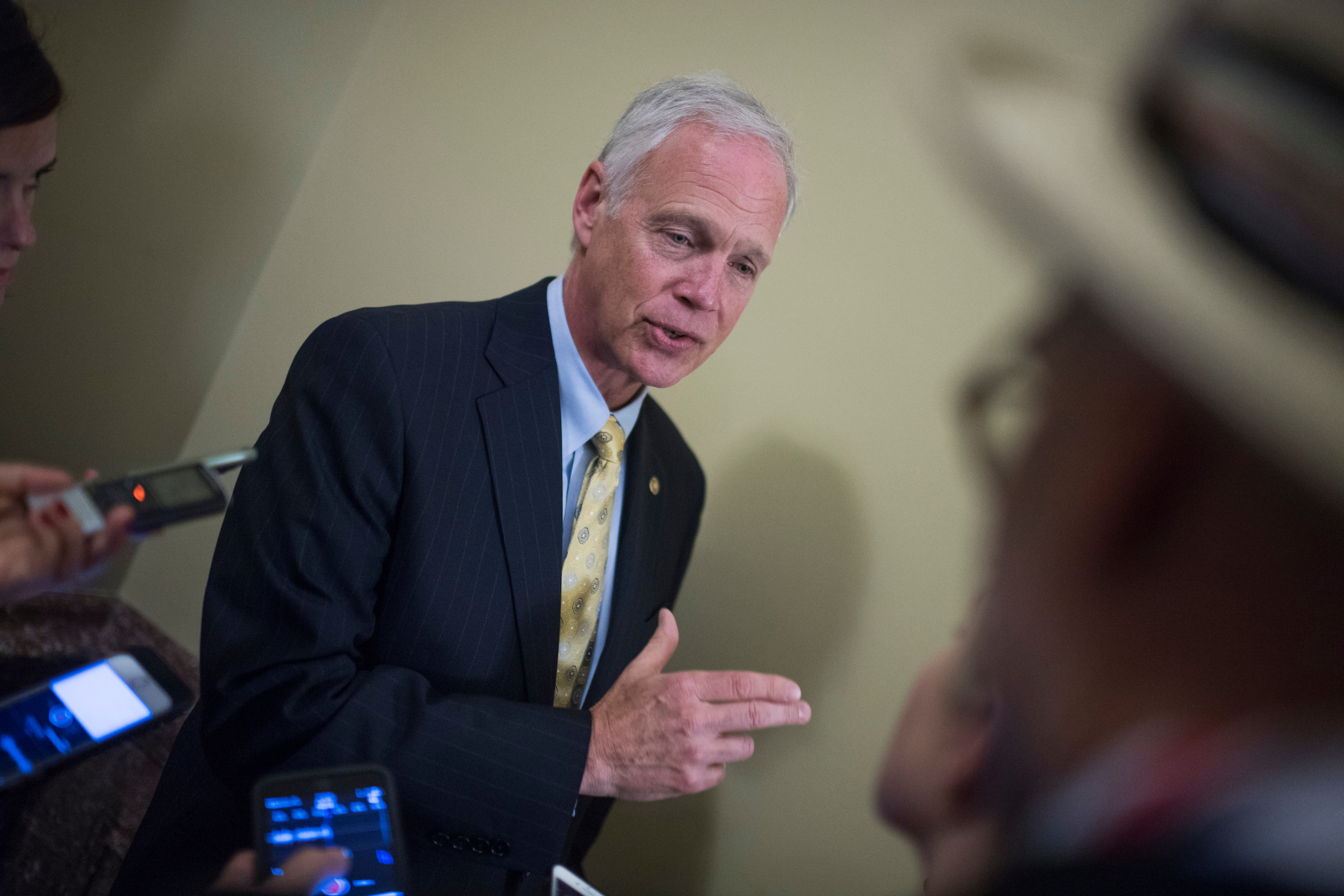 Wisconsin Sen. Ron Johnson is among the Republicans calling for more information about the tax overhaul effort. (Tom Williams/CQ Roll Call file photo)