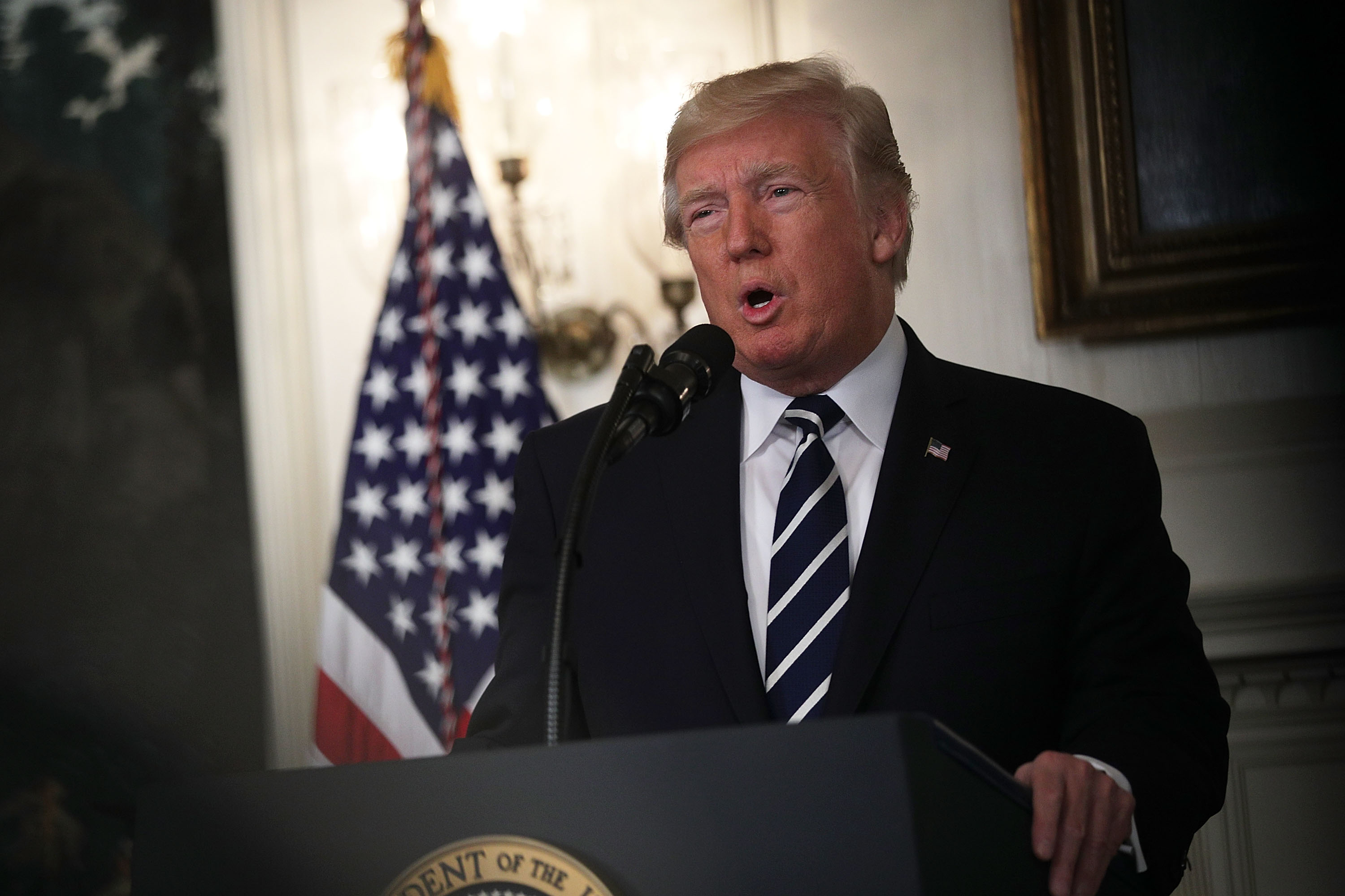 President Donald Trump delivers remarks earlier this month at the White House. On Friday, he announced he is decertifying the Iran nuclear deal — but keeping it in place for now. (Photo by Alex Wong/Getty Images)