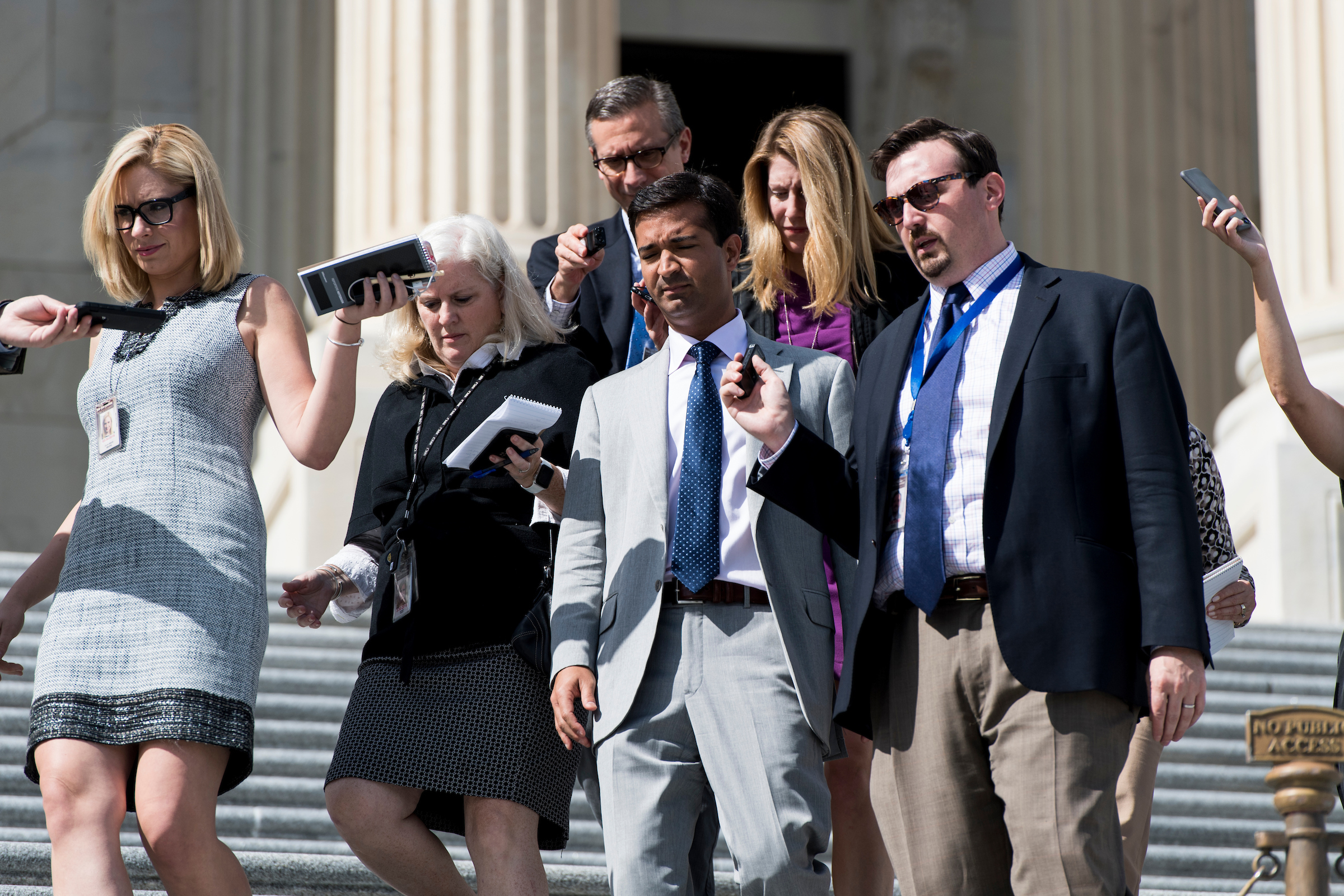 UNITED STATES - OCTOBER 5: Rep. Carlos Curbelo, R-Fla., speaks with reporters as he walks down the House steps after the last votes of the week on Thursday, Oct. 5, 2017. (Photo By Bill Clark/CQ Roll Call)