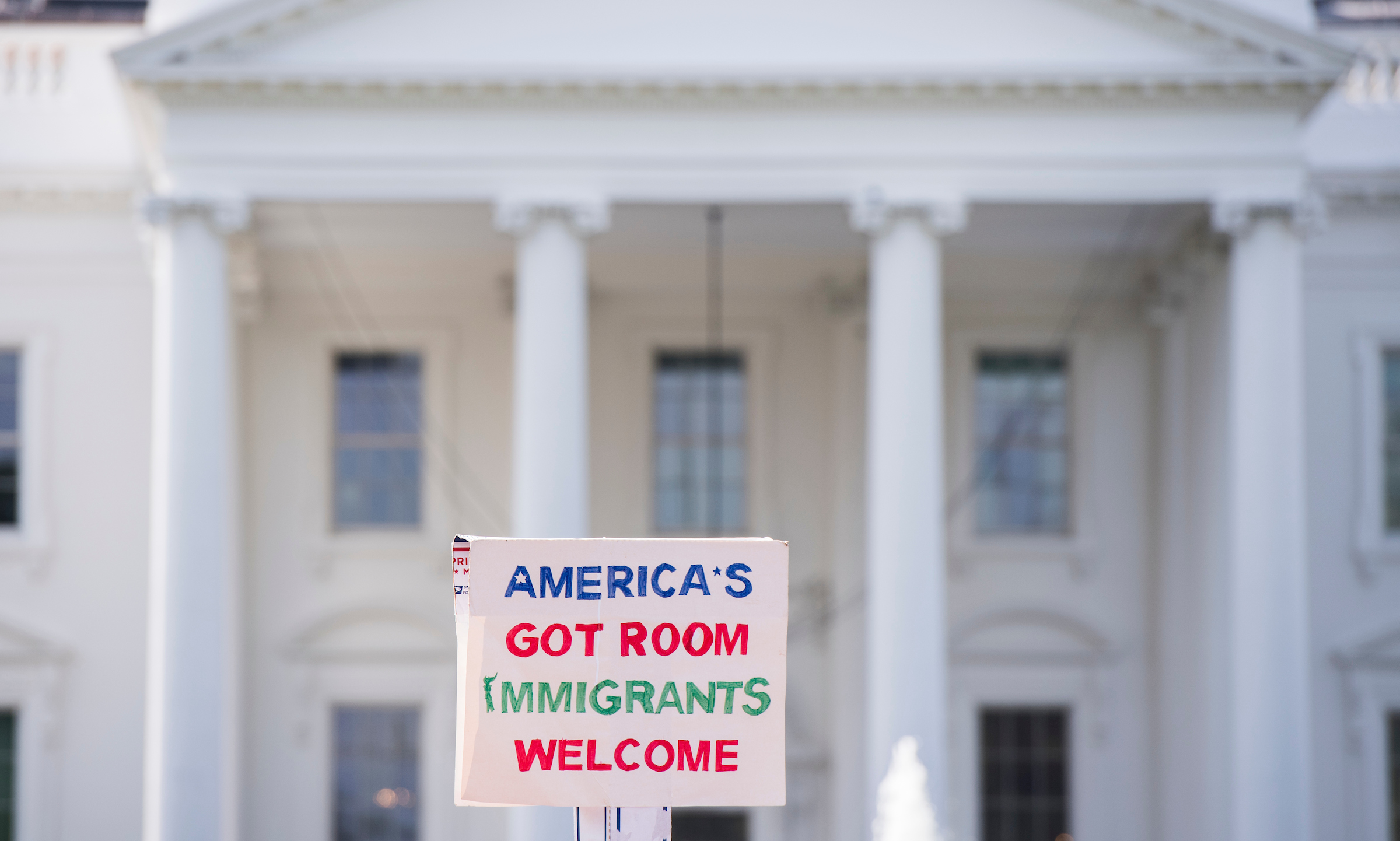 A sign at an immigration rights protest in from on the White House on Sept. 5 to oppose President Donald Trump’s decision to phase out the DACA program. (Bill Clark/Roll Call File Photo)