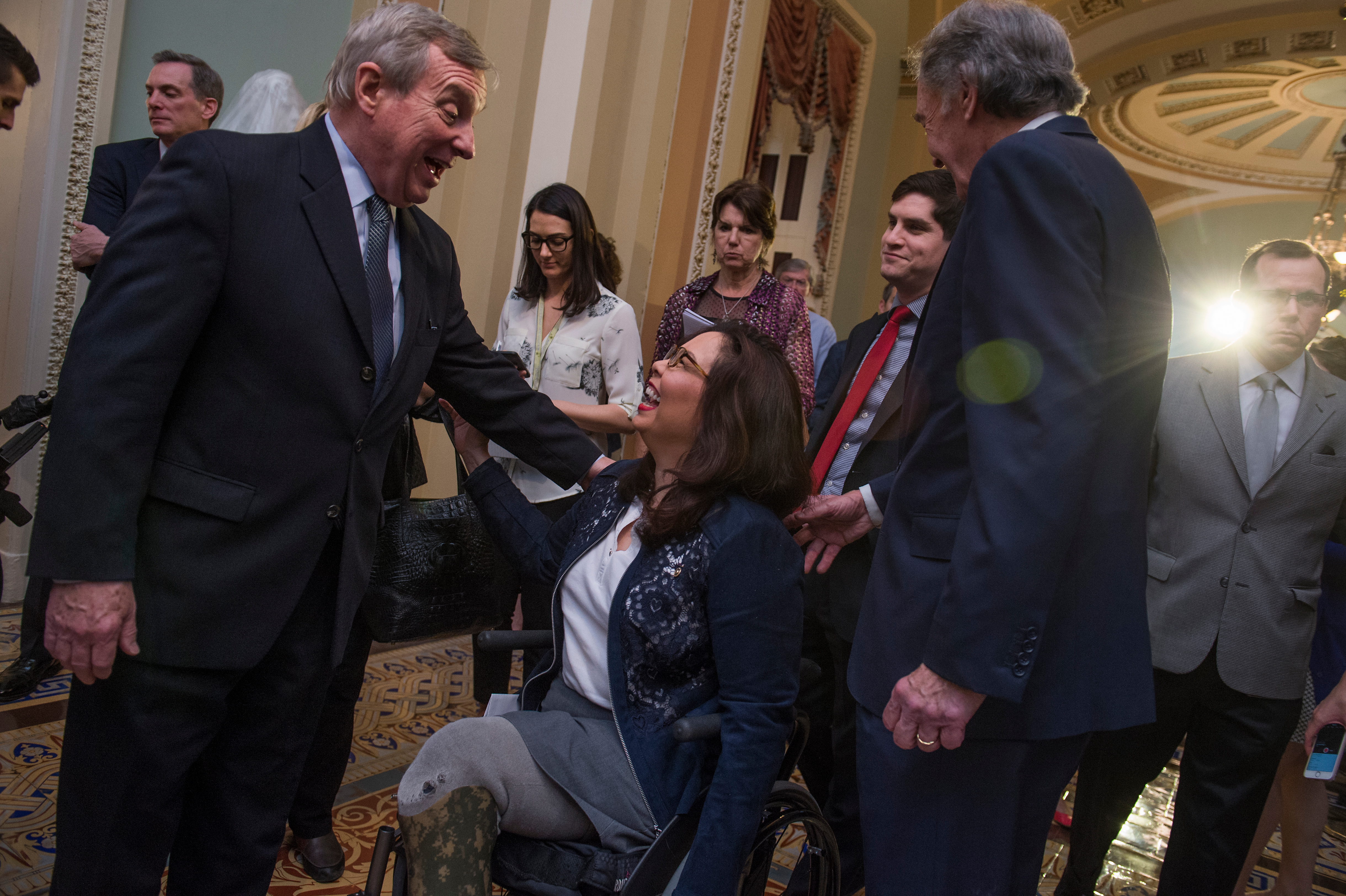 UNITED STATES - MAY 16: From left, Senate Minority Whip Richard Durbin, D-Ill., Sens. Tammy Duckworth, D-Ill., and Ed Markey, D-Mass., conclude a news conference after the Senate Policy luncheons in the Capitol on May 16, 2017. (Photo By Tom Williams/CQ Roll Call)