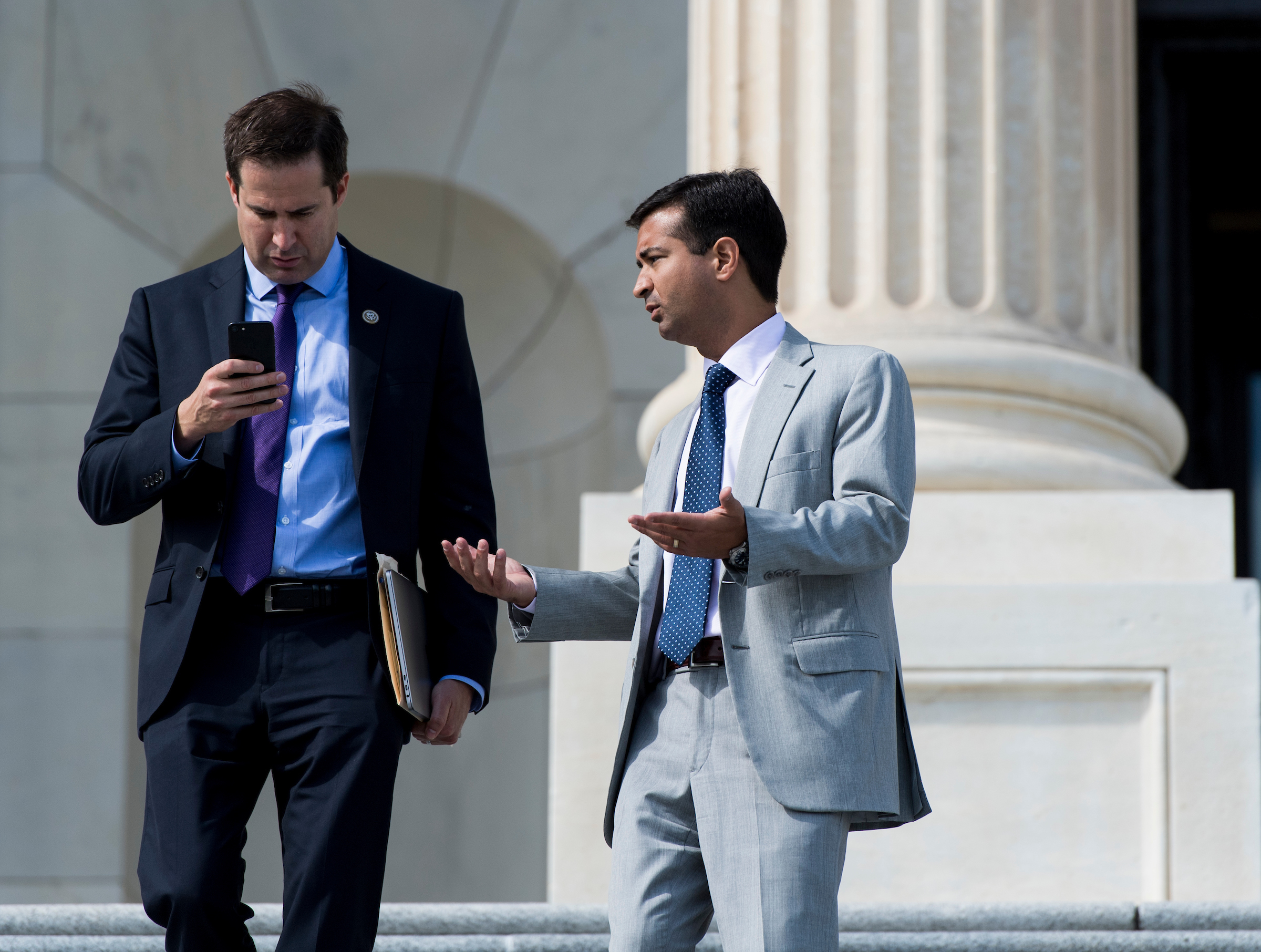 Rep. Seth Moulton, D-Nass., left, and Rep. Carlos Curbelo, R-Fla., introduced bipartisan legislation Tuesday to ban bump stock rifle attachments. (Photo By Bill Clark/CQ Roll Call)