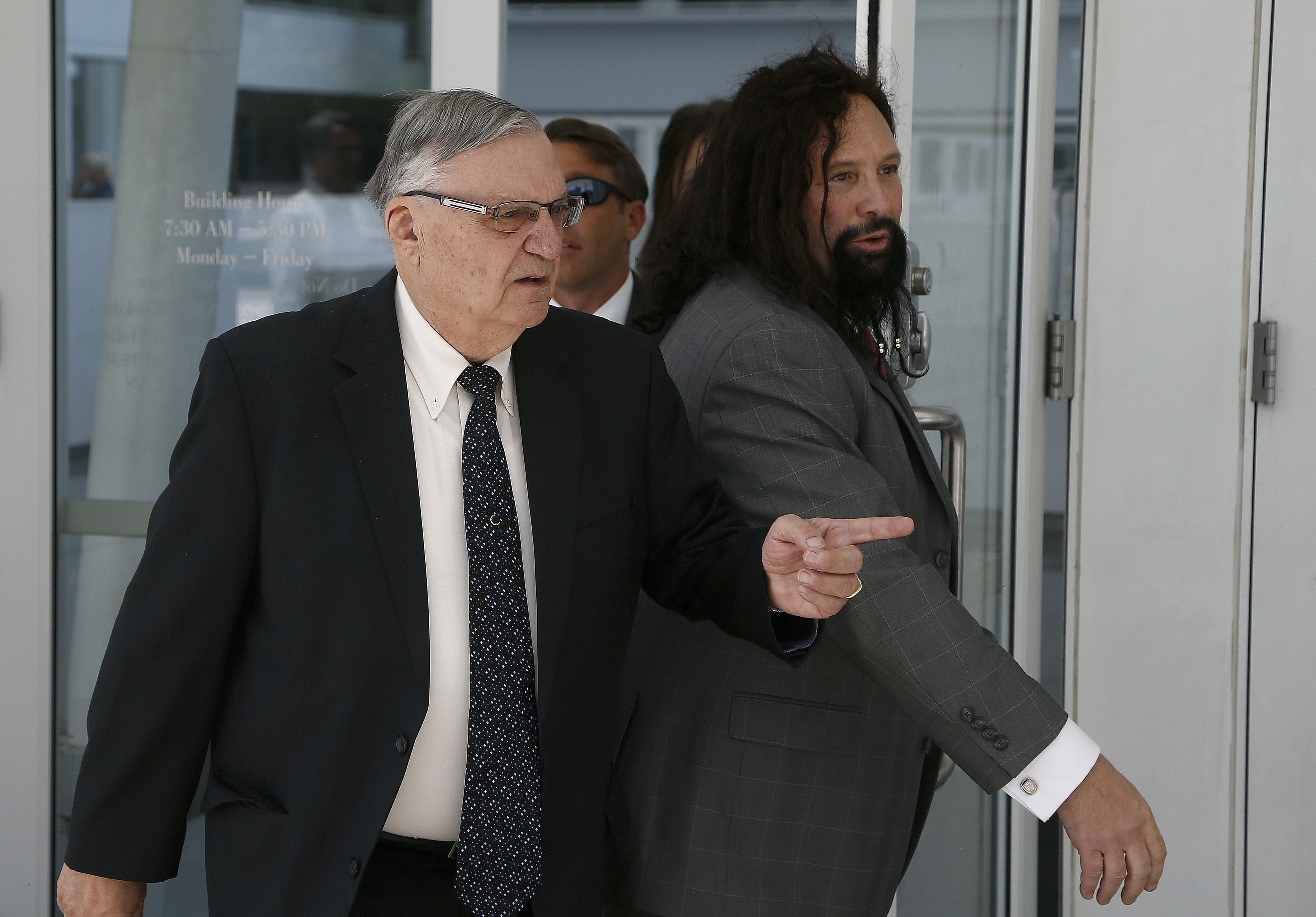 Former Maricopa County Sheriff Joe Arpaio leaves U.S. District Court in Phoenix during his trial for disobeying a court order to stop traffic patrols that targeted immigrants in July. (Ross D. Franklin/AP file photo)