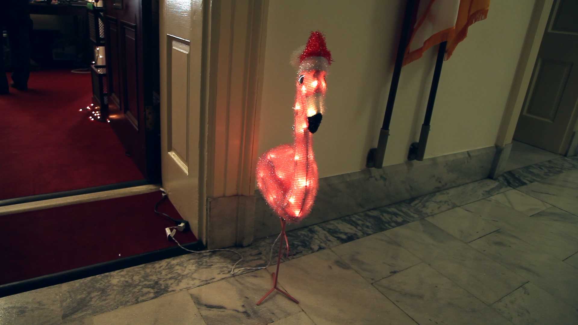 Rep. Francis Rooney, R-Fla., decorated the outside of his office with a holiday flamingo. (Bian Elkhatib/ CQ Roll Call)