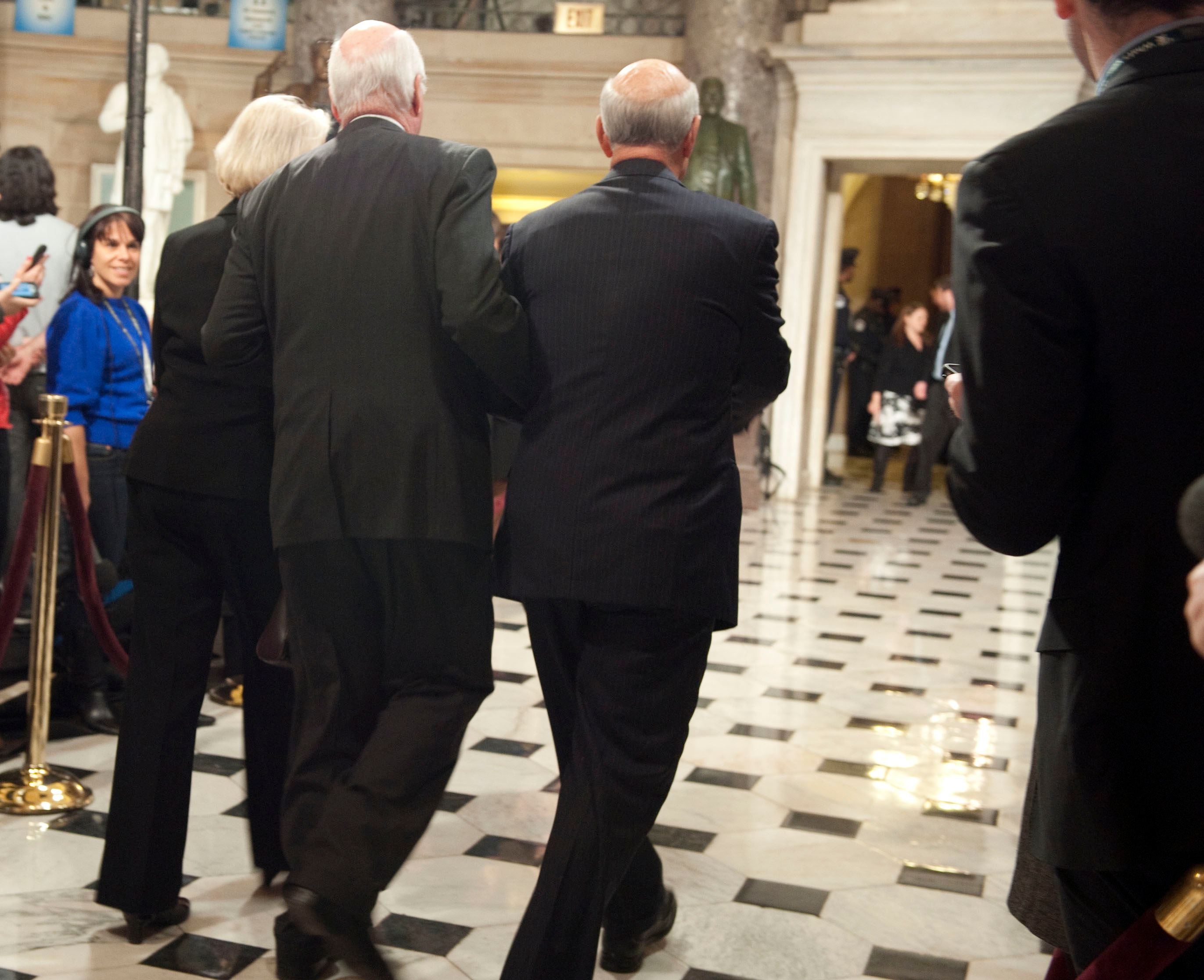 UNITED STATES - January 25, 2011 : Patrick Leahy, D-VT., (center) his wife Marcelle and Pat Roberts, R-KS., walk through Statuary Hall in the U.S. Capitol on their way to the House Chamber to hear President Barack Obama deliver his first State of the Union Address before a joint session of Congress on January 25, 2011. (Photo By Douglas Graham / CQ/Roll Call)