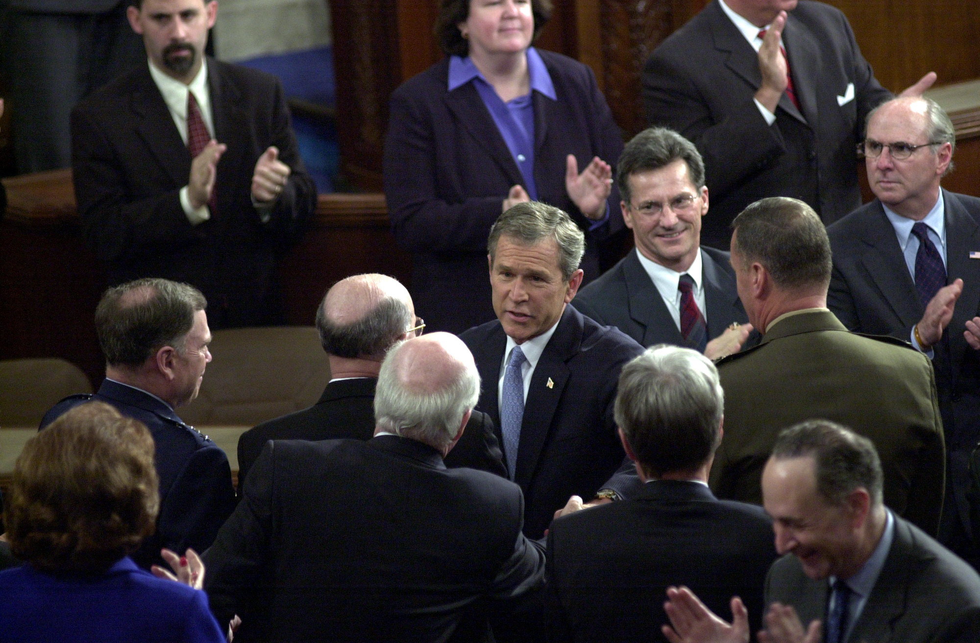 Union27/012902 -- President George W. Bush greets Patrick J. Leahy, D-Vt., before the State of the Union address.