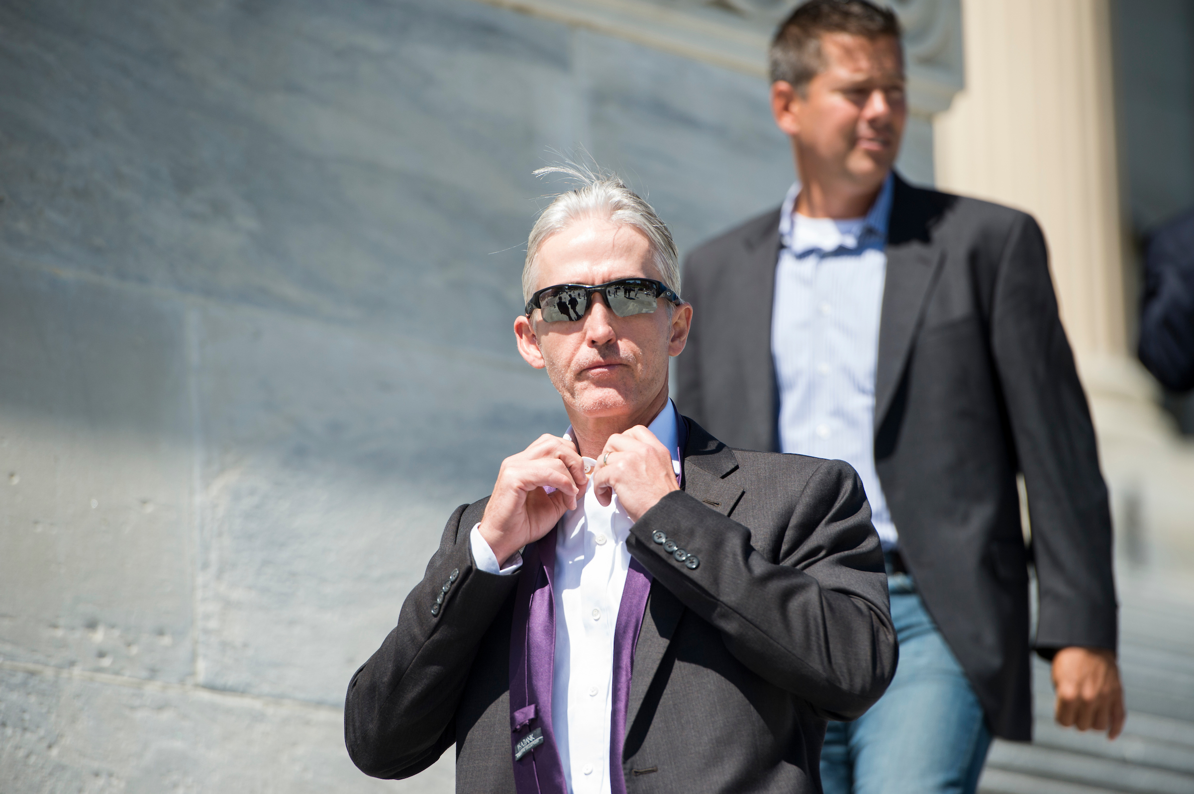 UNITED STATES - SEPTEMBER 11: Rep. Trey Gowdy, R-S.C., takes off his tie as he leaves the Capitol following the final vote of the week on Friday, Sept. 11, 2015. (Photo By Bill Clark/CQ Roll Call)
