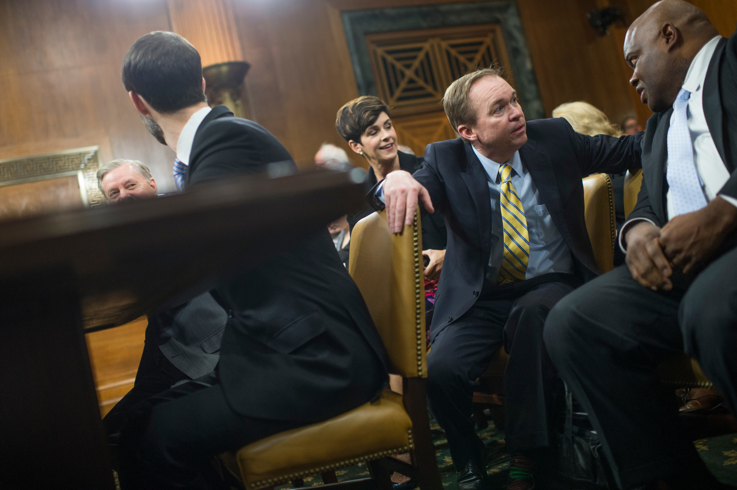 Then-Rep. Mick Mulvaney, R-S.C., second from right, before his Senate Budget Committee confirmation hearing in  January 2017. He's now acting White House chief of staff and leading a new tariff spat with Mexico. (Tom Williams/CQ Roll Call file photo)