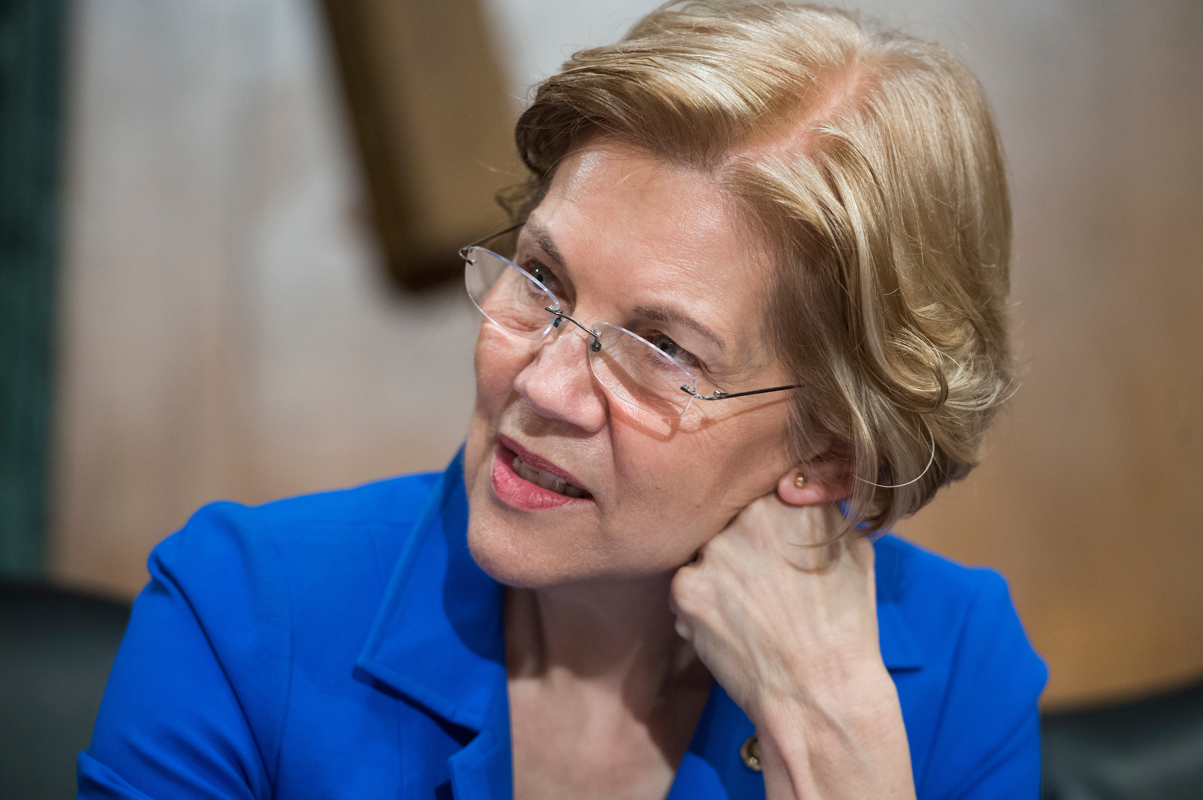 UNITED STATES - JANUARY 23: Sen. Elizabeth Warren, D-Mass., is seen during a Senate Banking, Housing and Urban Affairs Committee hearing in Dirksen Building on the nominations of Jelena McWilliams, Marvin Goodfriend, and Thomas Workman on January 23, 2018. (Photo By Tom Williams/CQ Roll Call)