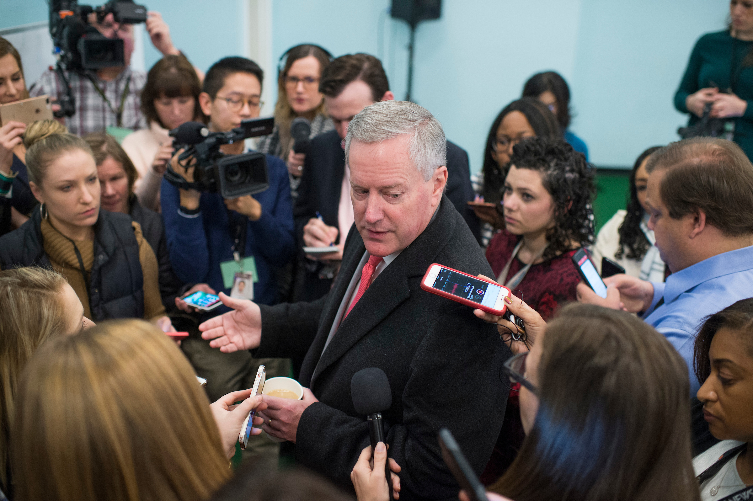 Rep. Mark Meadows, R-N.C., talks with reporters at the media center during the House and Senate Republican retreat on Thursday. (Tom Williams/CQ Roll Call)