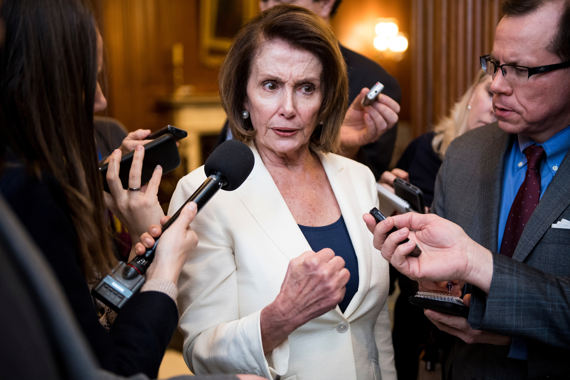 House Minority Leader Nancy Pelosi spoke for over eight hours on the floor Wednesday, telling the stories of “Dreamers.” Her record-breaking speech overshadowed the opening day of the House Democrats’ annual retreat, including former Vice President Joseph R. Biden Jr.’s advice to the caucus to “holler more loudly.” (Bill Clark/CQ Roll Call)