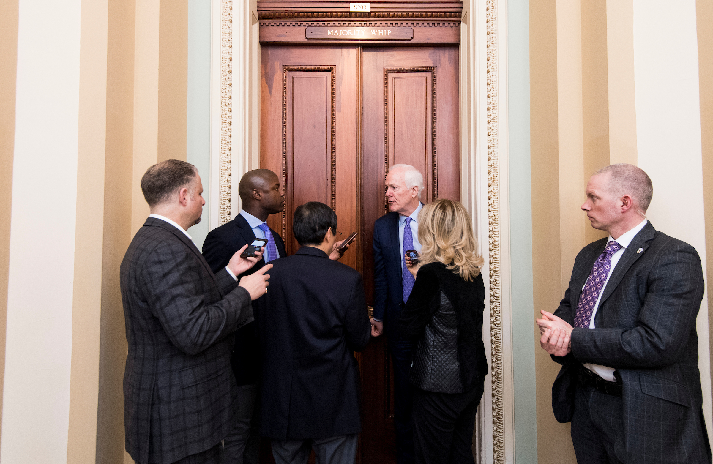 : Sen. John Cornyn, R-Texas, speaks with reporters outside of his office in the Capitol on Wednesday, Feb. 28, 2018. (Photo By Bill Clark/CQ Roll Call)