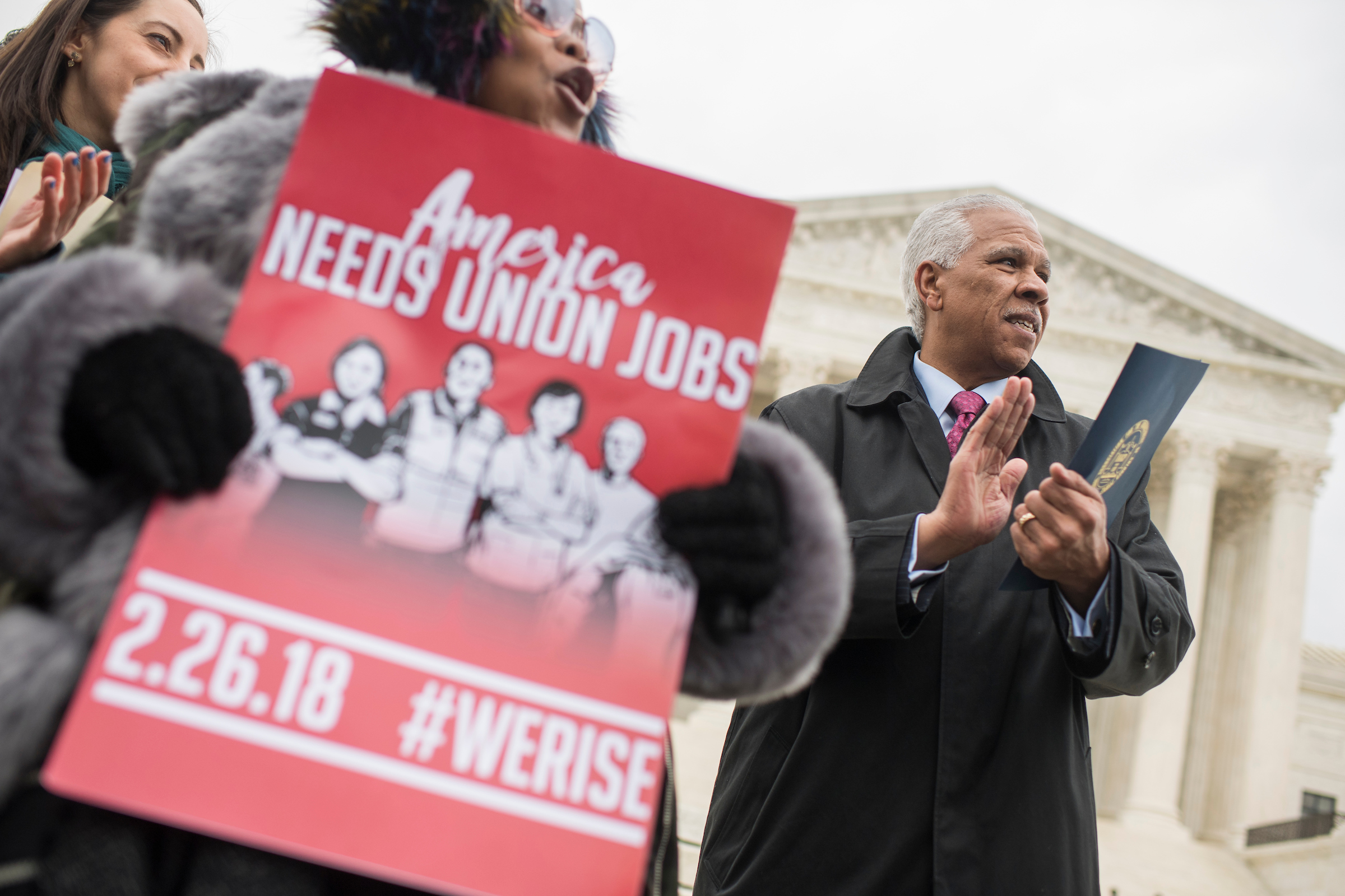 UNITED STATES - FEBRUARY 26: Hilary O. Shelton, director of the NAACP's Washington bureau, appears outside the Supreme Court in support of unions as the Court hears arguments on a lawsuit filed by Illinois state worker Mark Janus, on February 26, 2018. Janus feels his rights are being violated by having to pay dues to a union he doesn't support, the American Federation of State, County and Municipal Employees. (Photo By Tom Williams/CQ Roll Call)