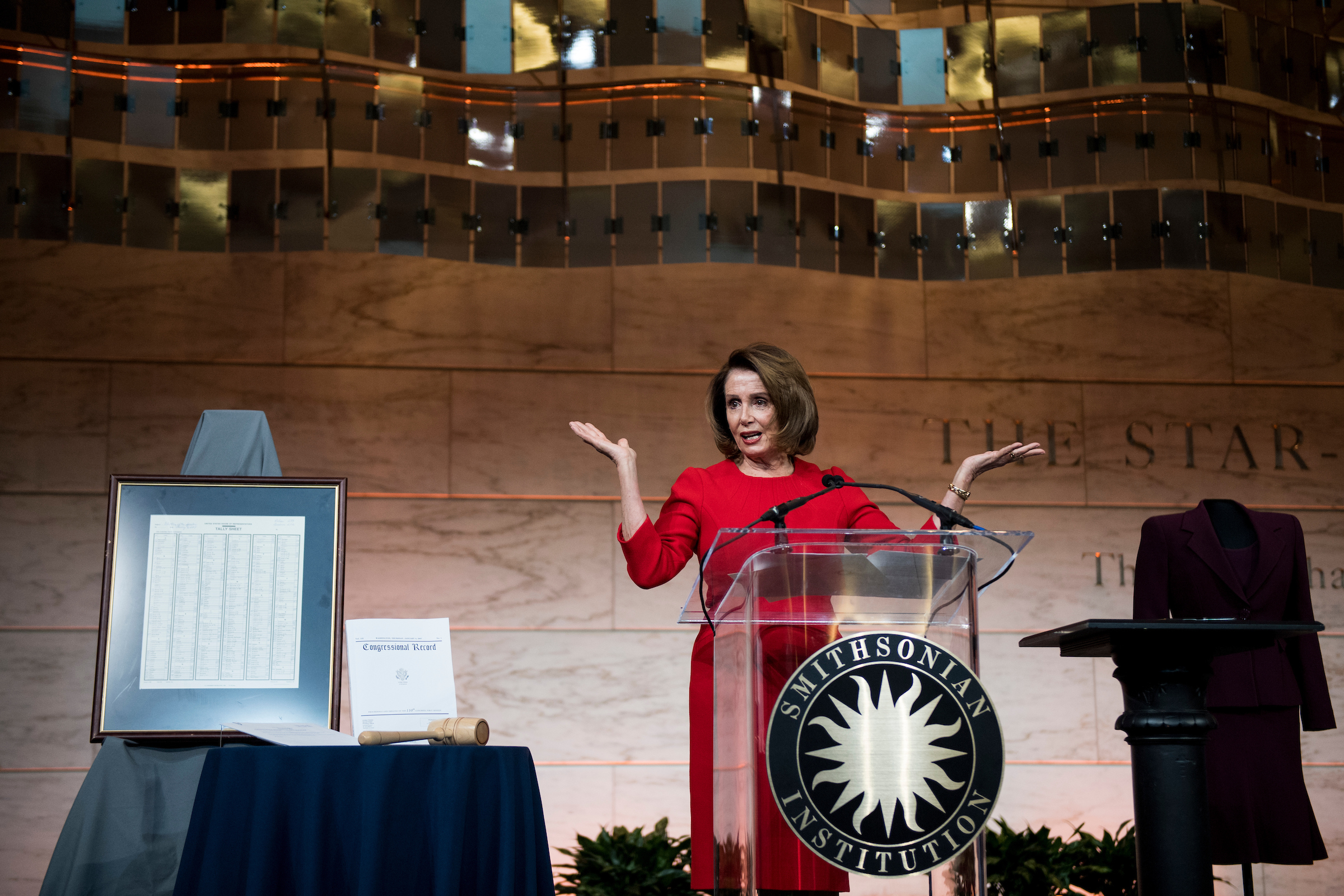 UNITED STATES - MARCH 7: House Minority Leader Nancy Pelosi, D-Calif., speaks at the The National Museum of American History where she donated items representing her term as the first female Speaker of the House on Wednesday, March 7, 2018. Items donated included her gavel, the tally sheet from her election as Speaker and a dress. (Photo By Bill Clark/CQ Roll Call)