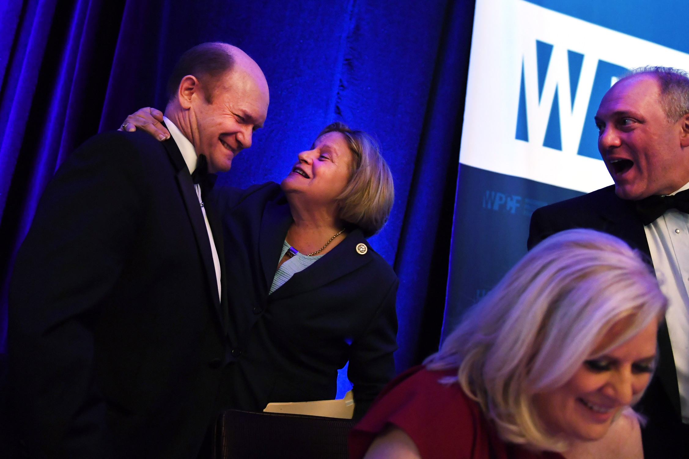 Rep. Ileana Ros-Lehtinen, R-Fla., Sen. Chris Coons, D-Del., CNN's Deirdre Walsh and House Majority Whip Steve Scalise, R-La., yuk it up. (Tom Williams/CQ Roll Call)