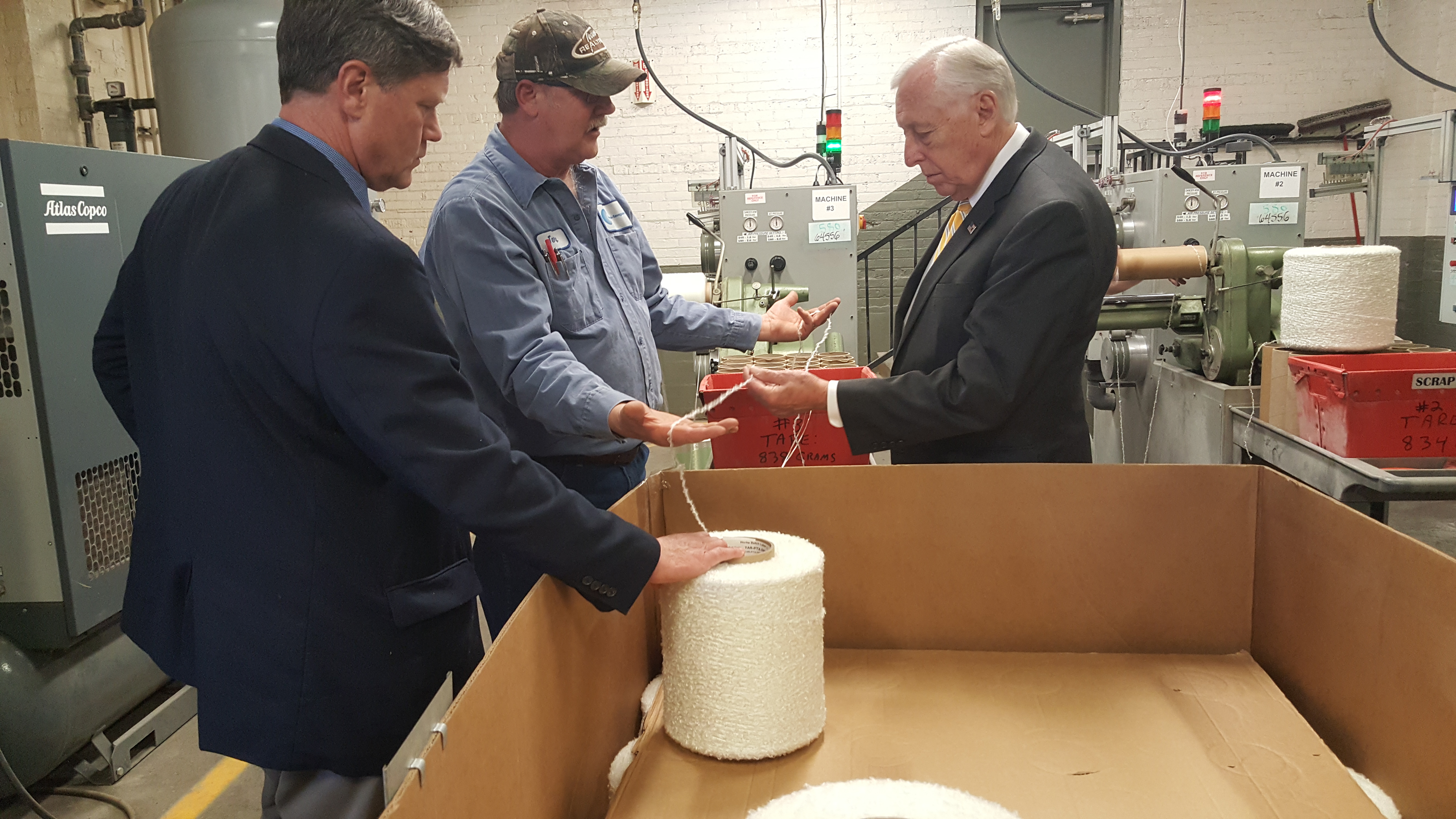 House Minority Whip Steny H. Hoyer, D-Md., right, and Rep. Ron Kind, D-Wis., left, tour Culimeta-Saveguard, an exhaust insulation manufacturing facility in Eau Claire, Wis., last week during Hoyer’s Make It In America listening tour.(Lindsey McPherson/CQ Roll Call)