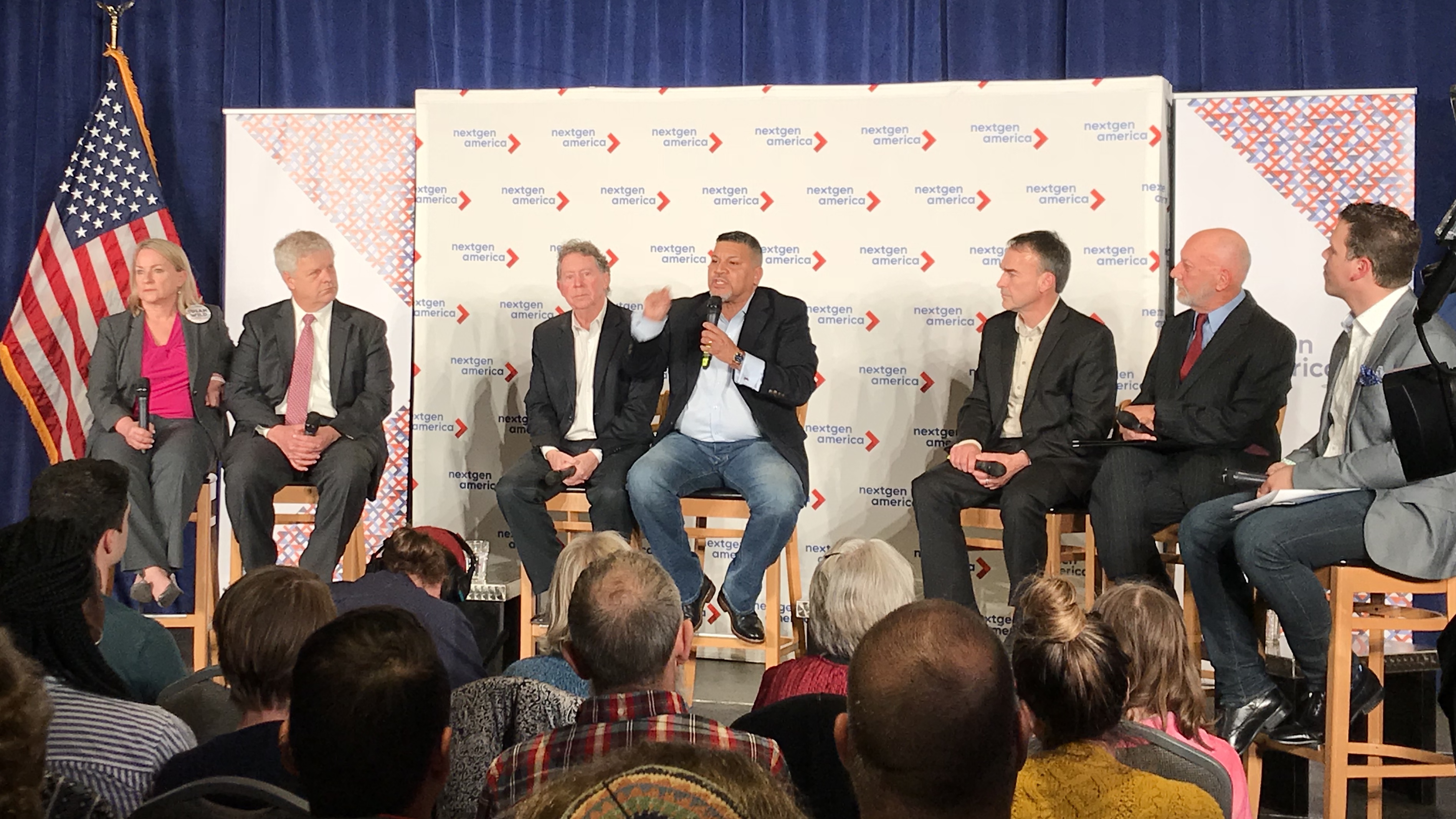 Greg Edwards, center, speaks at a forum with Democratic candidates in Pennsylvania’s 7th District. (Bridget Bowman/CQ Roll Call)