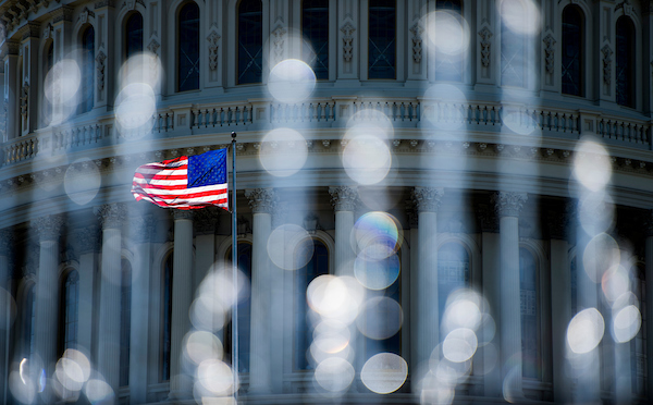 The Capitol dome as seen through one of the fountains on the east front on Thursday, April 26, 2018. (Photo By Bill Clark/CQ Roll Call)