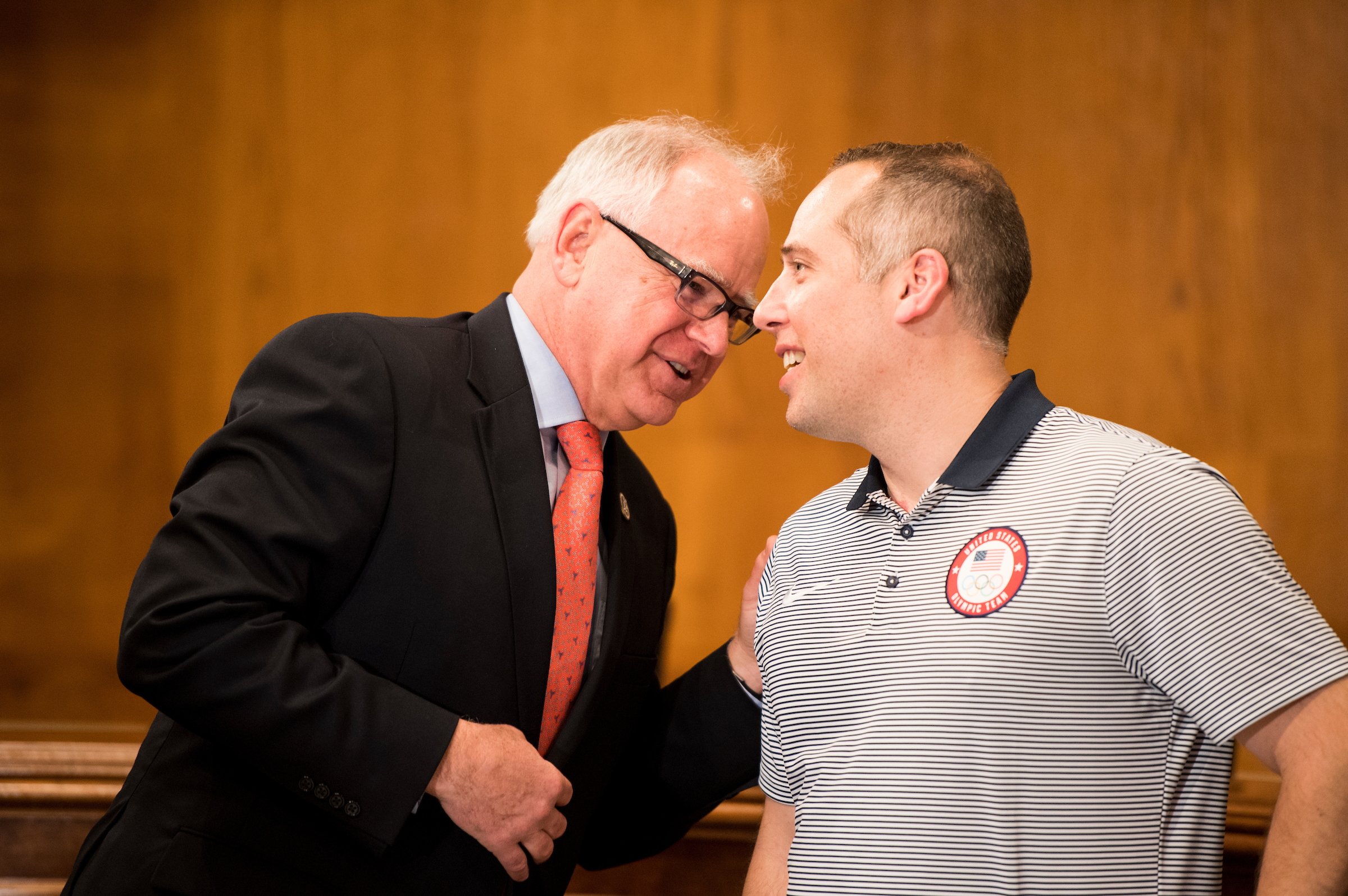 Rep. Tim Walz, D-Minn., left, speaks with judge Phil Drobnick, coach of the US Olympic gold medal curling team, at the eighth annual Minnesota Congressional Delegation Hotdish Competition in the Dirksen Senate Office Building on Wednesday, April 25, 2018. (Photo By Bill Clark/CQ Roll Call)