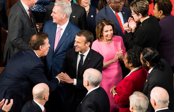 French President Emmanuel Macron shakes hands with members of Congress as he arrives to address both the House and Senate in a joint meeting of Congress on Wednesday, April 25, 2018. (Photo By Bill Clark/CQ Roll Call)