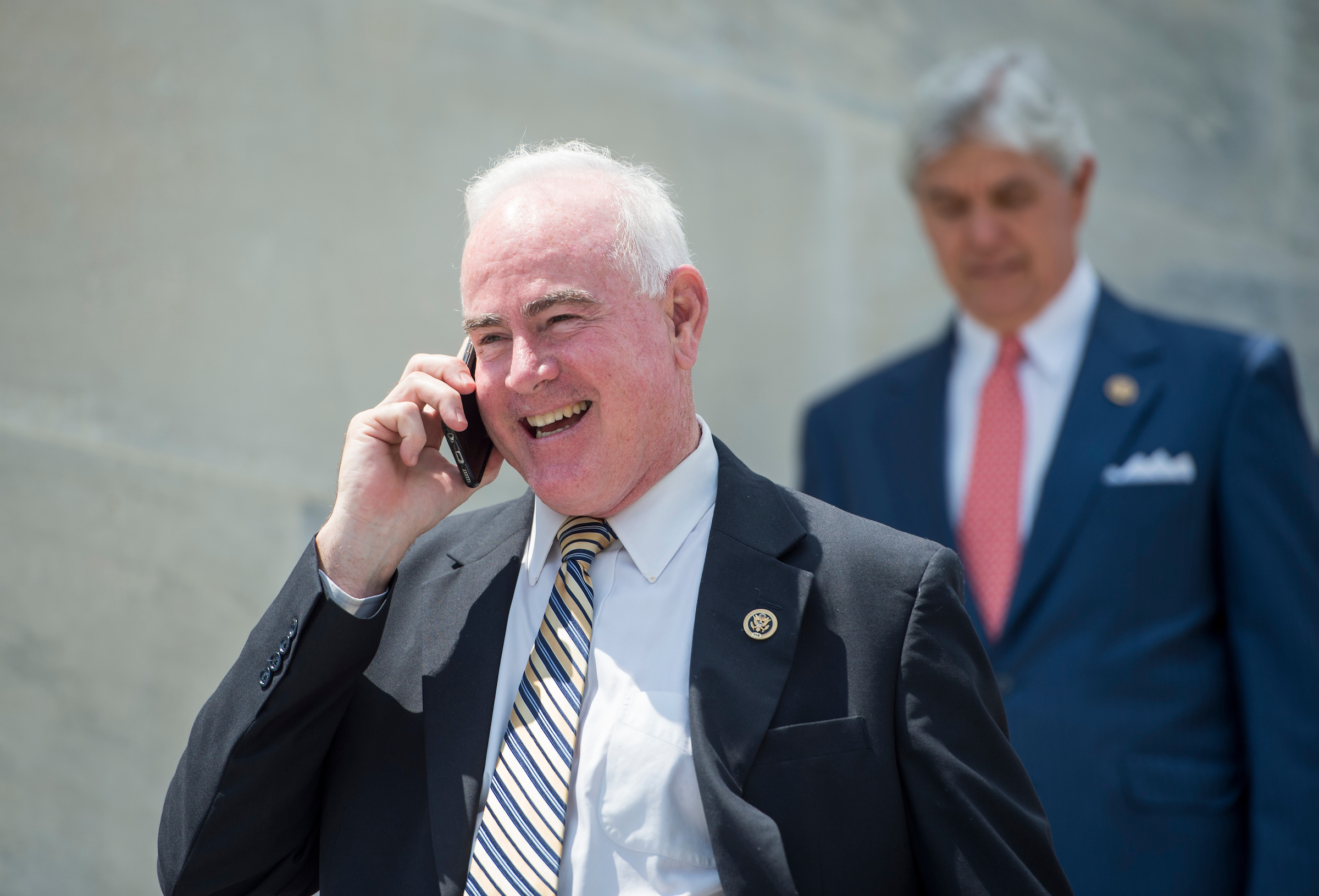 Rep. Pat Meehan, R-Pa., talks on his phone as he walks down the House steps following votes in the Capitol on Wednesday, May 25, 2016. (Photo By Bill Clark/CQ Roll Call)