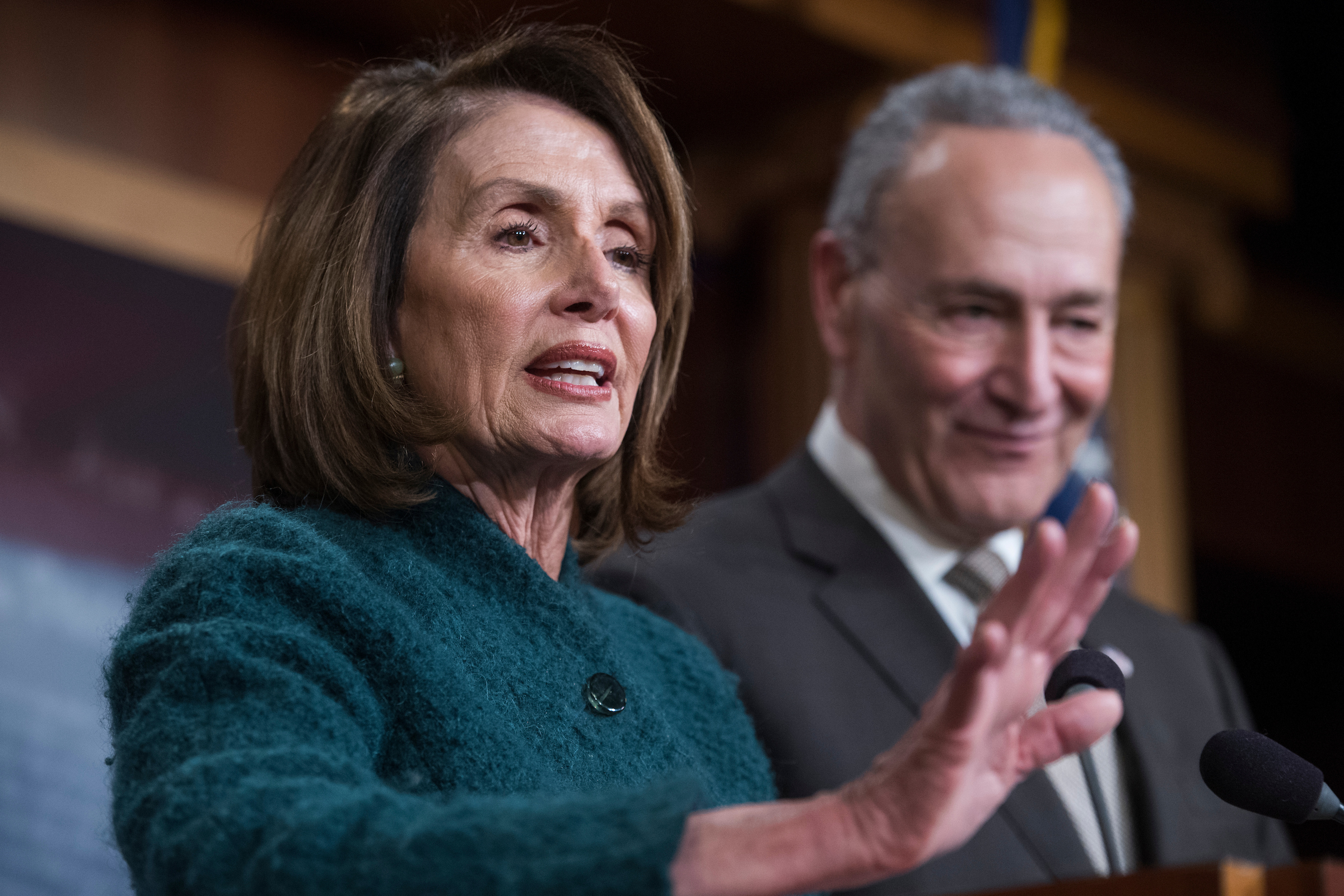 House Minority Leader Nancy Pelosi, D-Calif., and Senate Minority Leader Charles Schumer, D-N.Y., conduct a news conference in the Capitol on the passage of the omnibus spending bill in the House. (Photo By Tom Williams/CQ Roll Call)