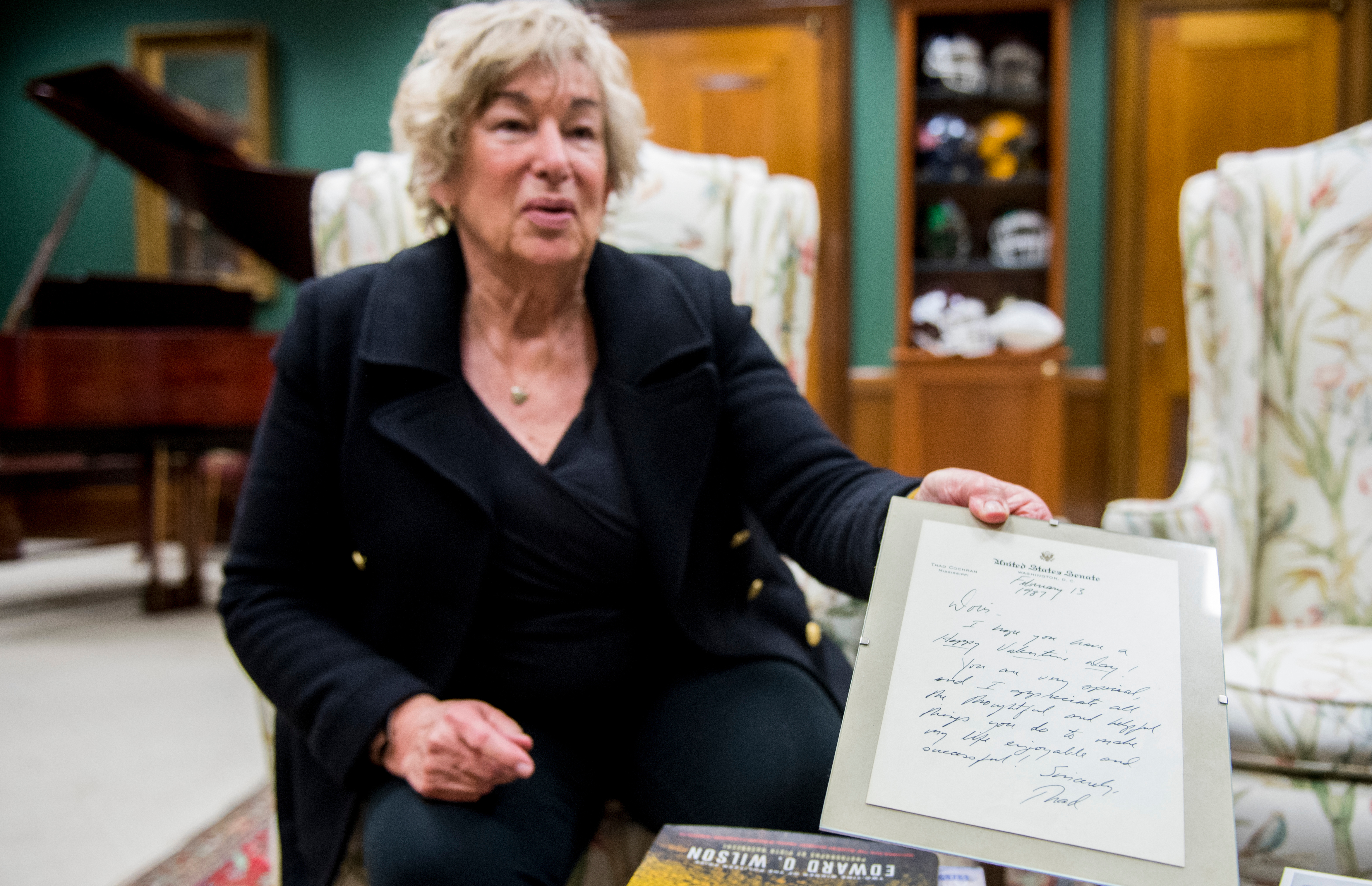 UNITED STATES - MARCH 22: Doris Wagley, Sen. Thad Cochran’s scheduler, shows a framed note to her from Sen. Cochran as she speaks with Roll Call in his office in the Dirksen Senate Office Building on Thursday, March 22, 2018. Doris started working for Cochran in 1973 when he was a newly-elected Congressman. (Photo By Bill Clark/CQ Roll Call)