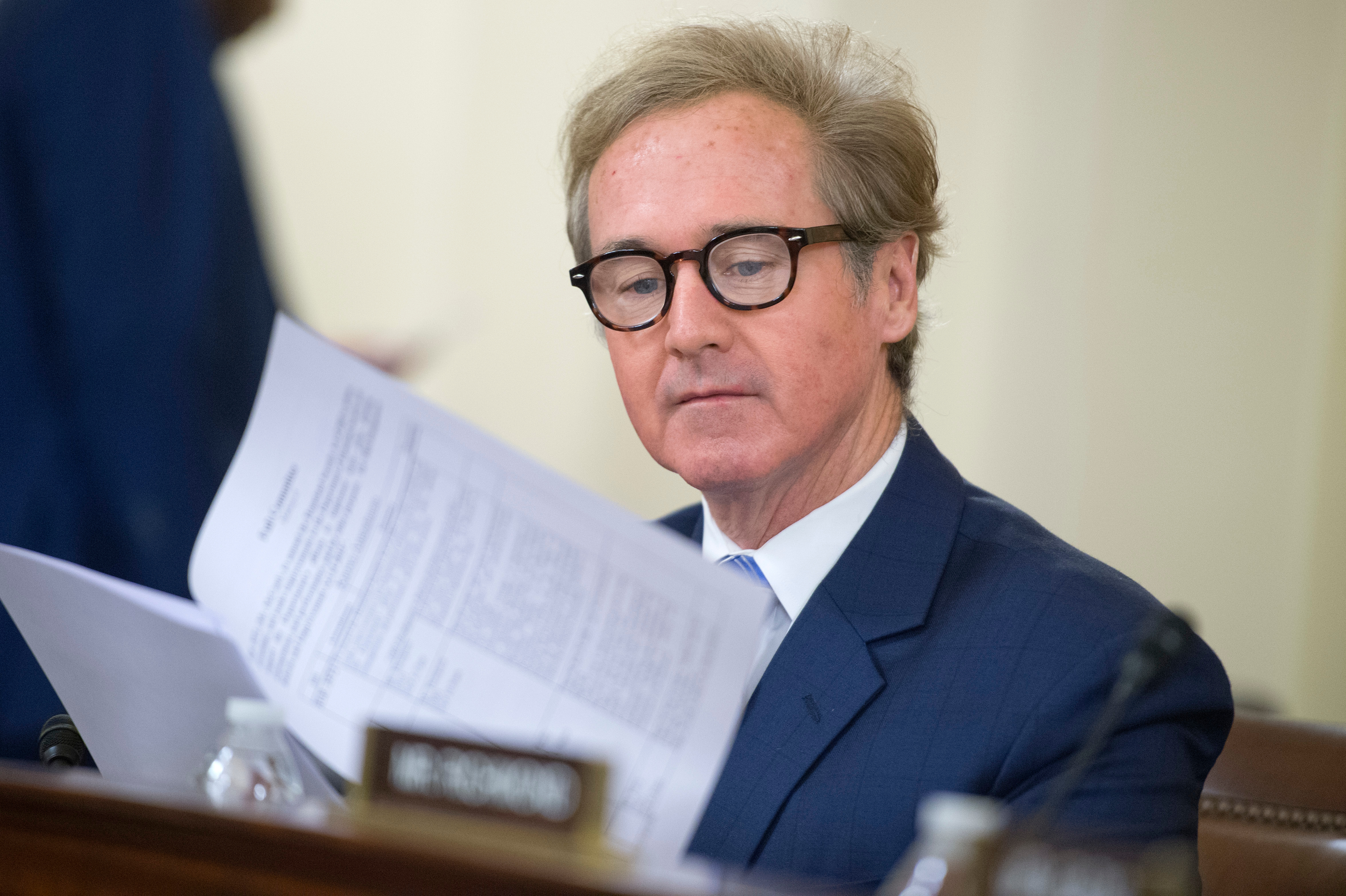 Rep. Brian Higgins, D-N.Y., sleeps in his congressional office. (Tom Williams/CQ Roll Call)