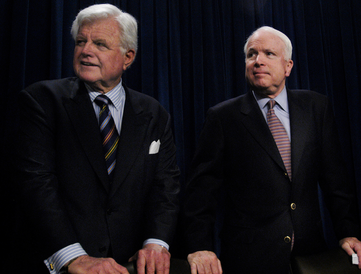 Sen. John McCain, right, has written advice for the lawmakers fighting the next immigration battle, highlighting his own with former Sen. Edward M. Kennedy. (Chris Maddaloni/CQ Roll Call file photo)