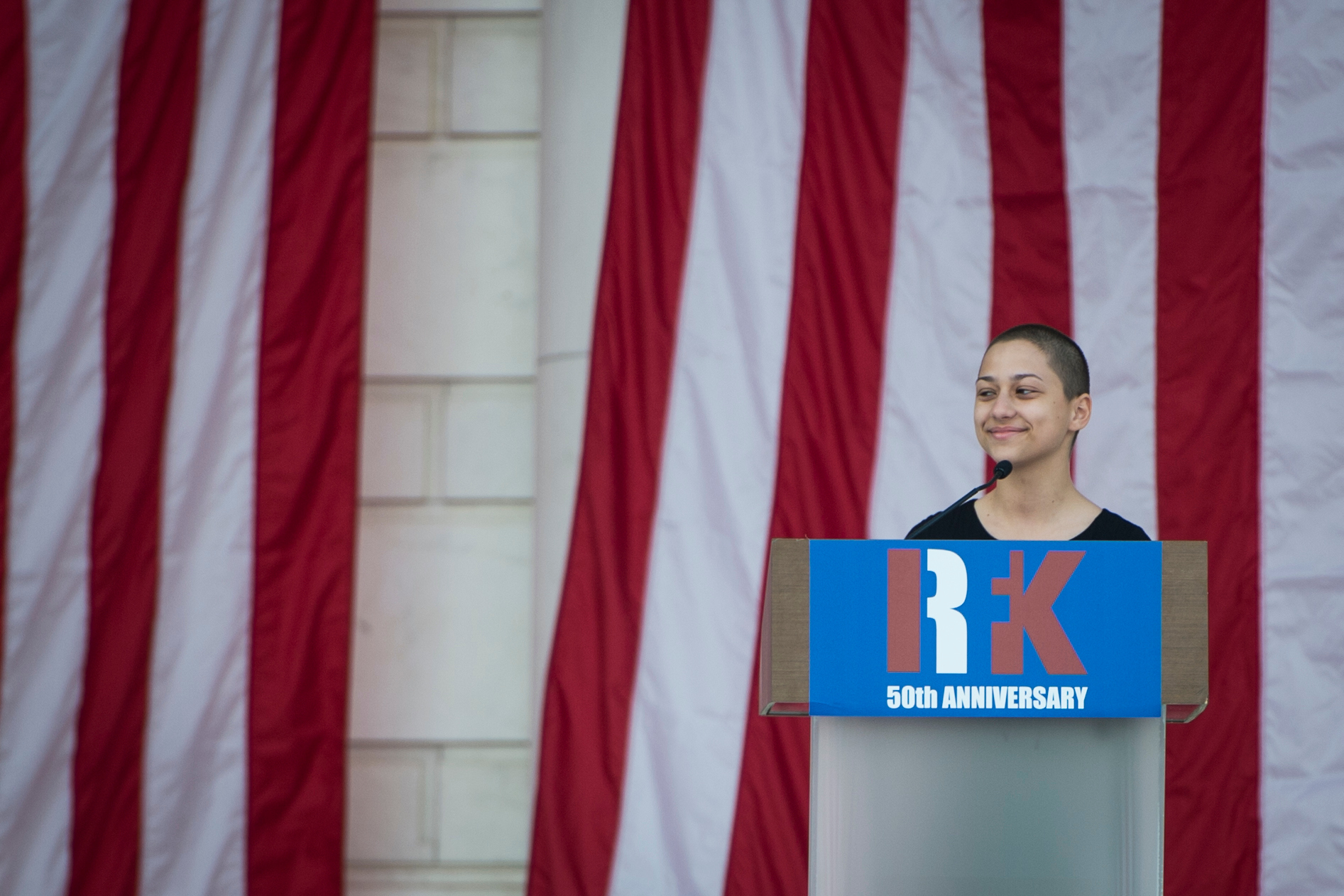 Emma Gonzalez, a survivor of the Marjory Stoneman Douglas High School shooting and representative of March for Our Lives, reads a quote from Robert Francis Kennedy during a memorial service at Arlington National Cemetery held on the 50th anniversary of his assassination Wednesday, June 6, 2018. (Sarah Silbiger/CQ Roll Call)