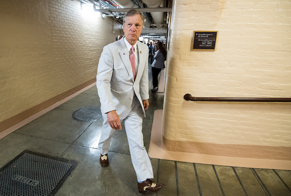 Rep. Brian Babin, R-Texas sports his seersucker suit as he leaves the House Republicans' caucus meeting in the Capitol on immigration reforms on Thursday morning, June 7, 2018. (Photo By Bill Clark/CQ Roll Call)