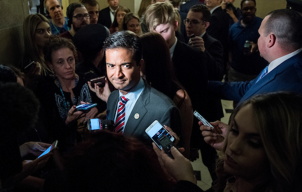 UNITED STATES - JUNE 21: Rep. Carlos Curbelo, R-Fla., speaks with reporters as he leaves Speaker Ryan's office on Thursday, June 21, 2018, as House GOP leadership tries to find a path to pass immigration legislation. (Photo By Bill Clark/CQ Roll Call)